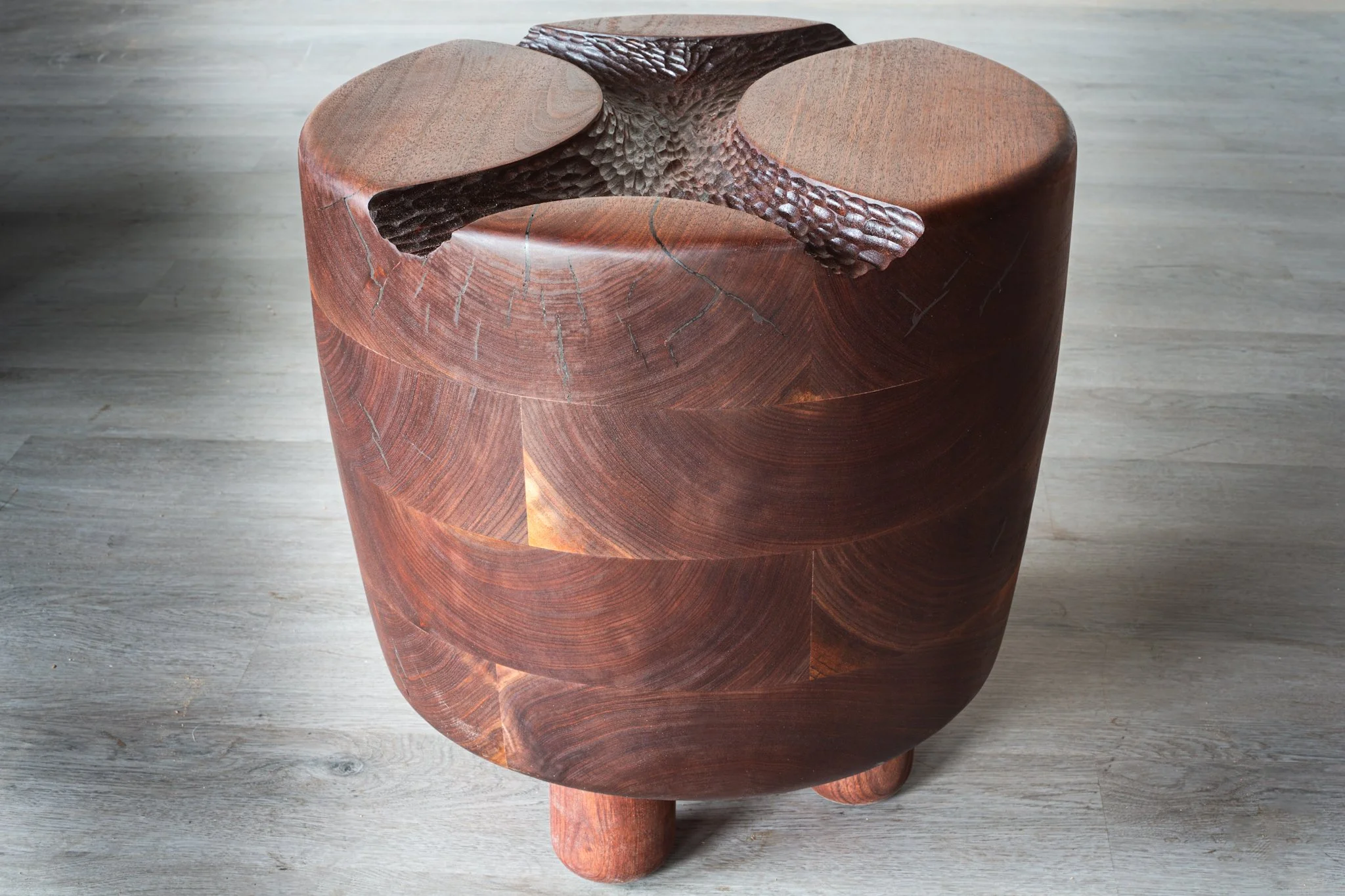 Walnut side table with sculpted top