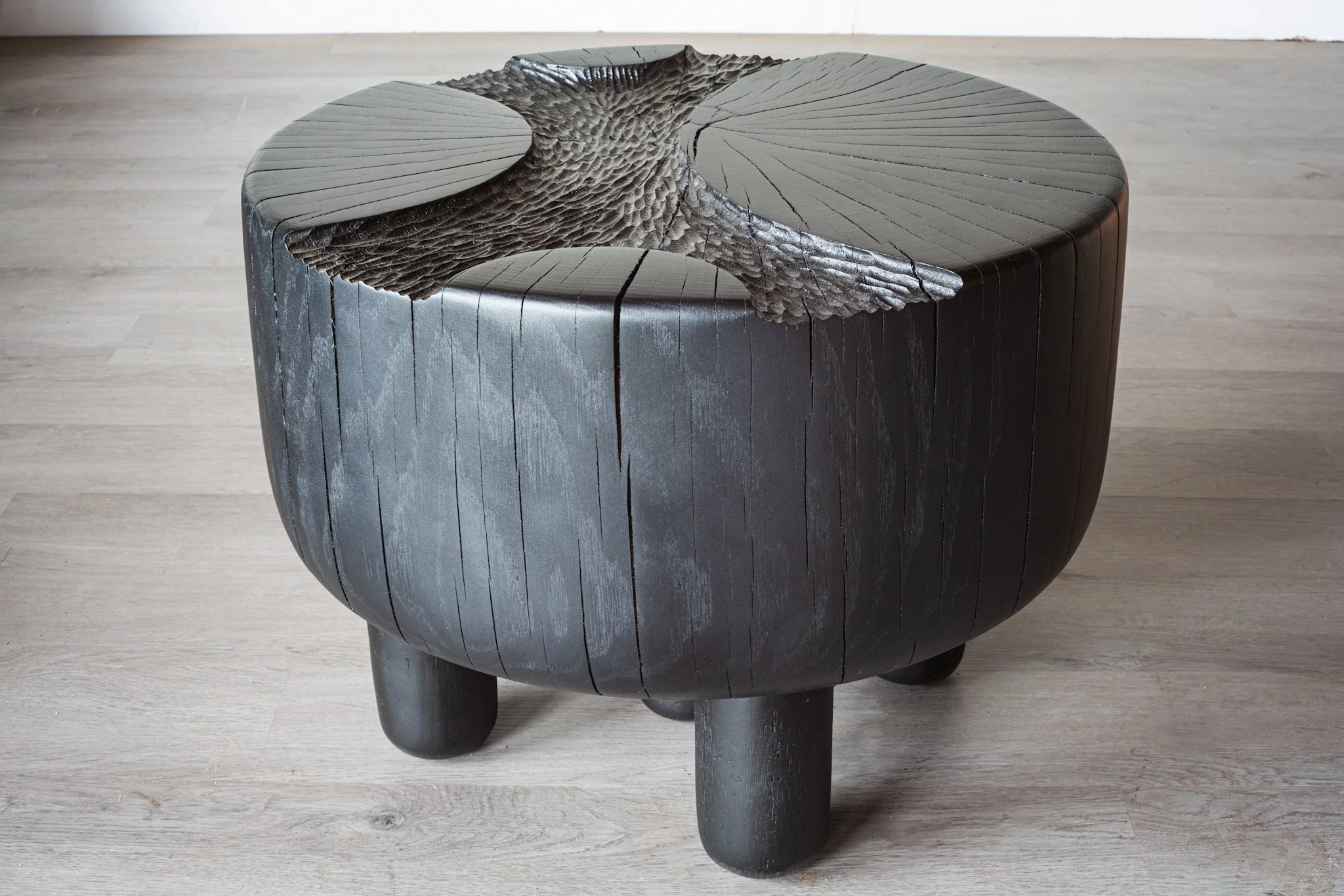 Ebonized white oak side table with sculpted top