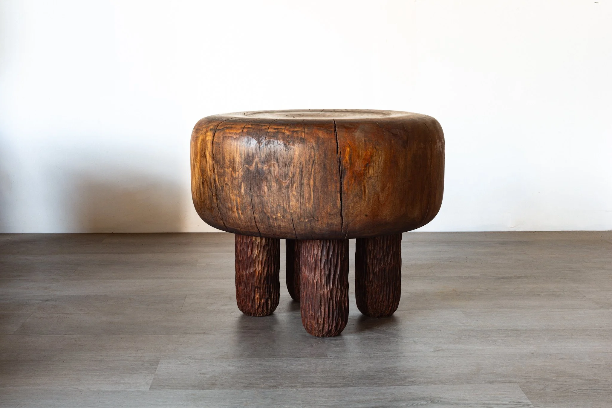 Black walnut side table with four textured legs