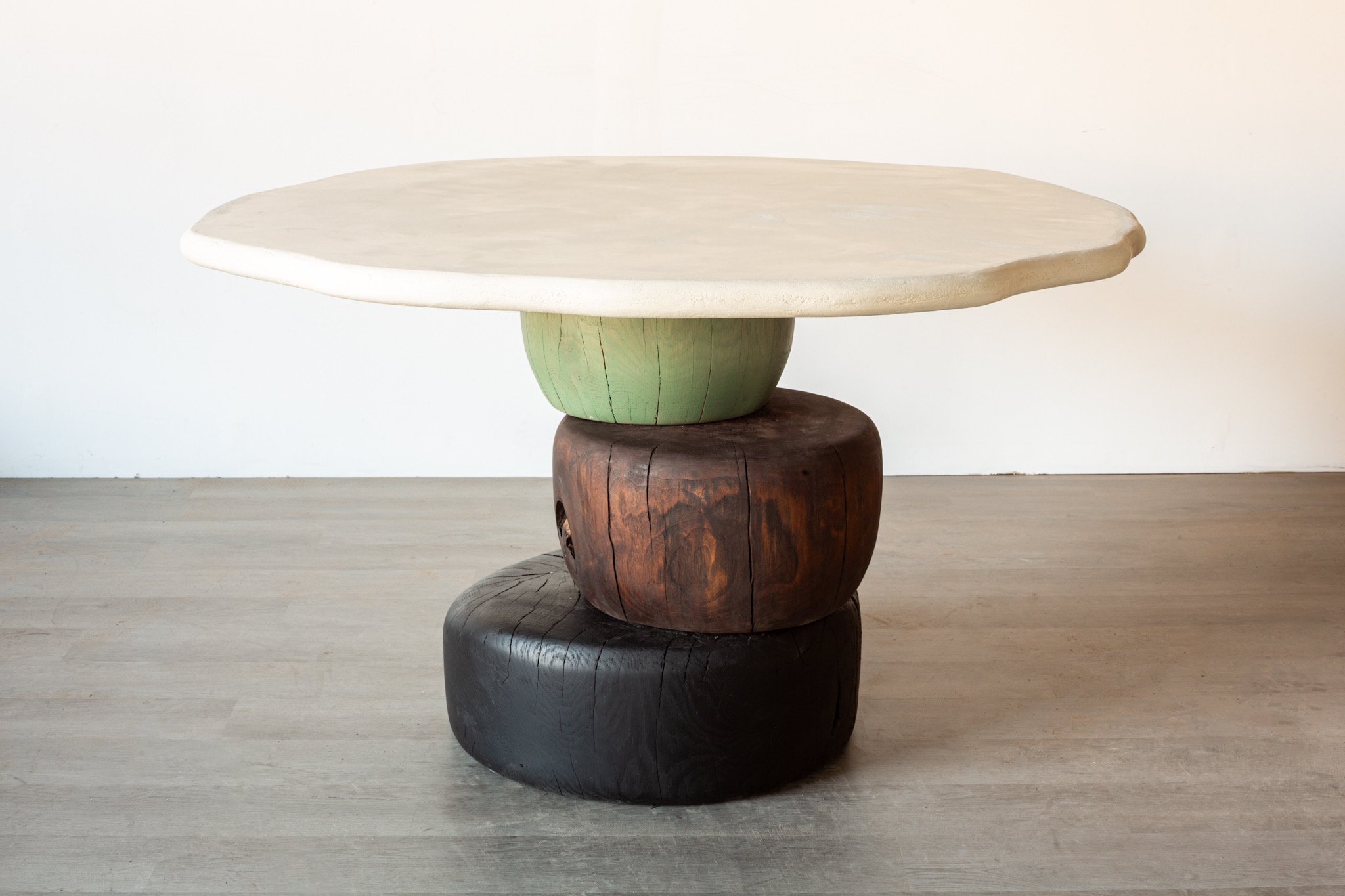 Mixed wood and micro cement dining table