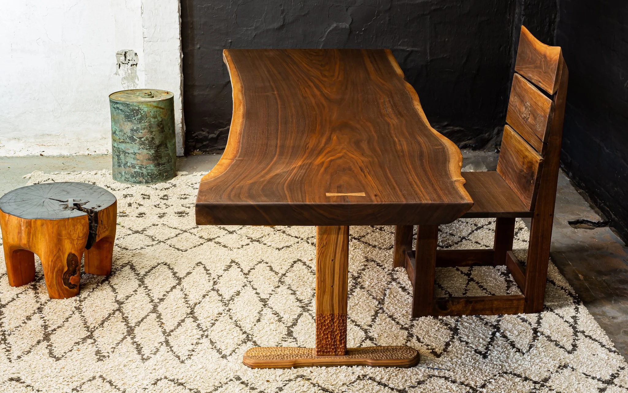 Black walnut dining table with sinker cypress wood carved base