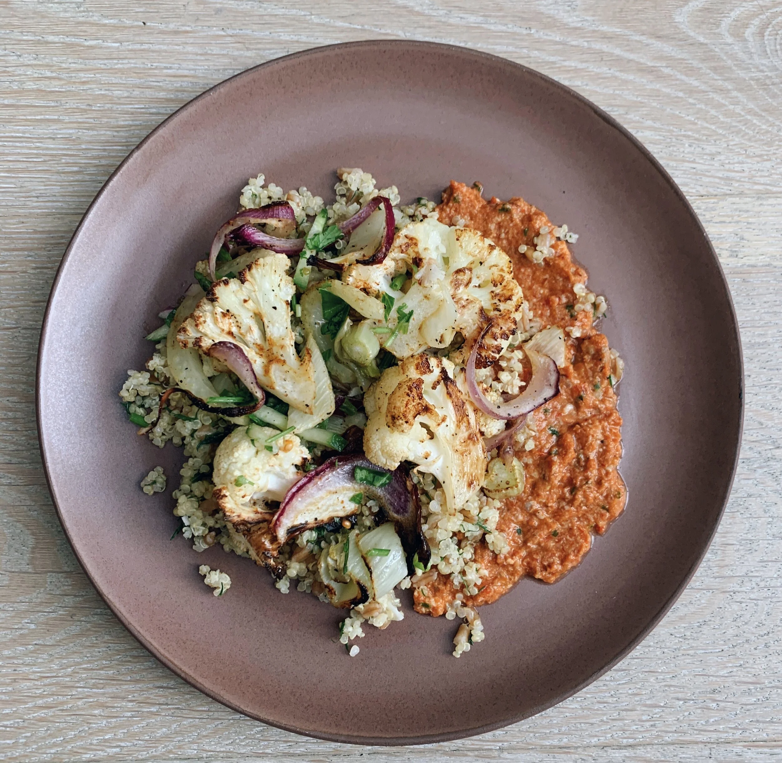 roasted cauliflower with herby grains and roasted bell pepper pesto.jpeg