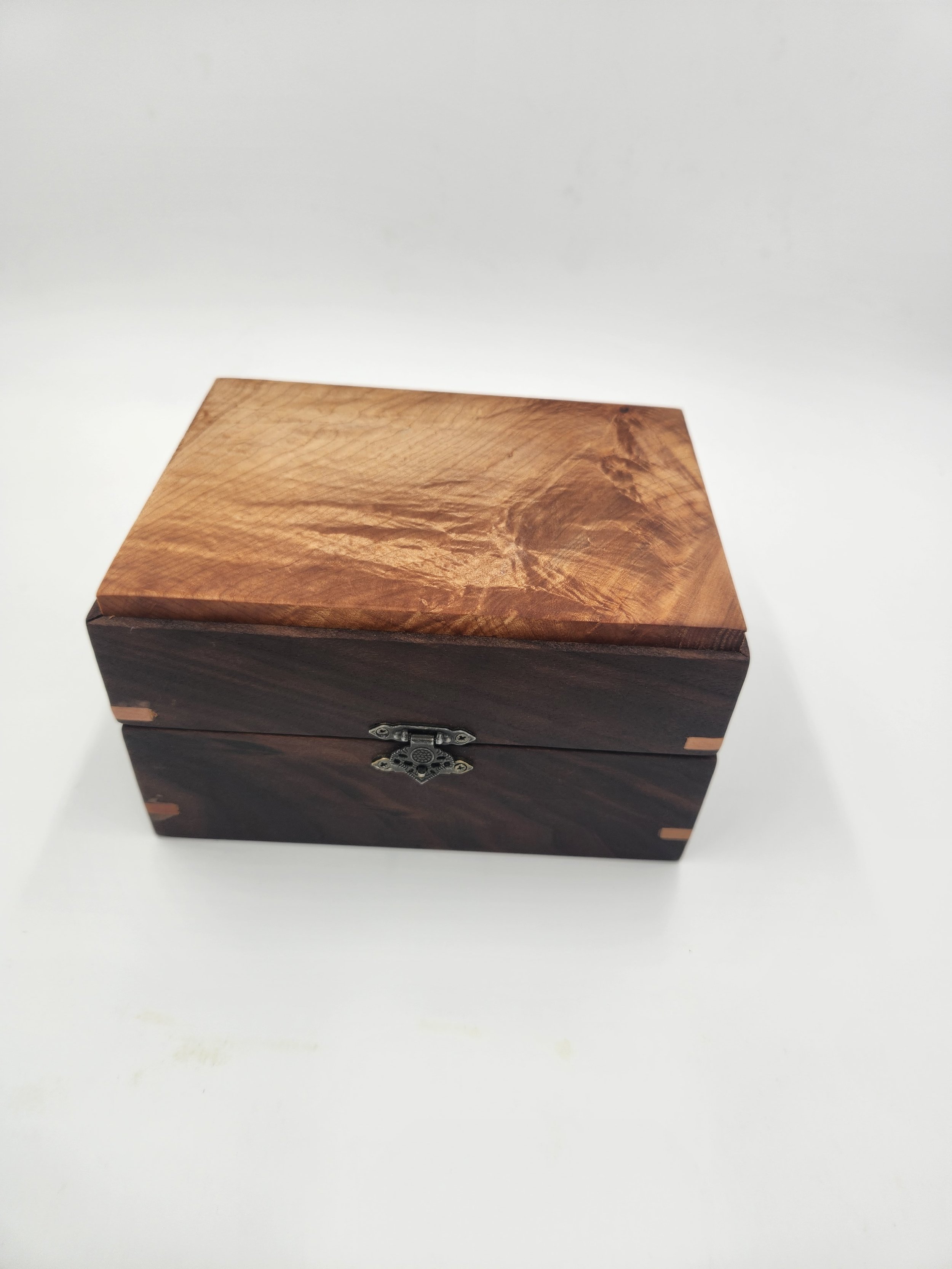 Decorative mitered box with brass latch and hinges, Walnut, with a Big Leaf Maple inset lid.