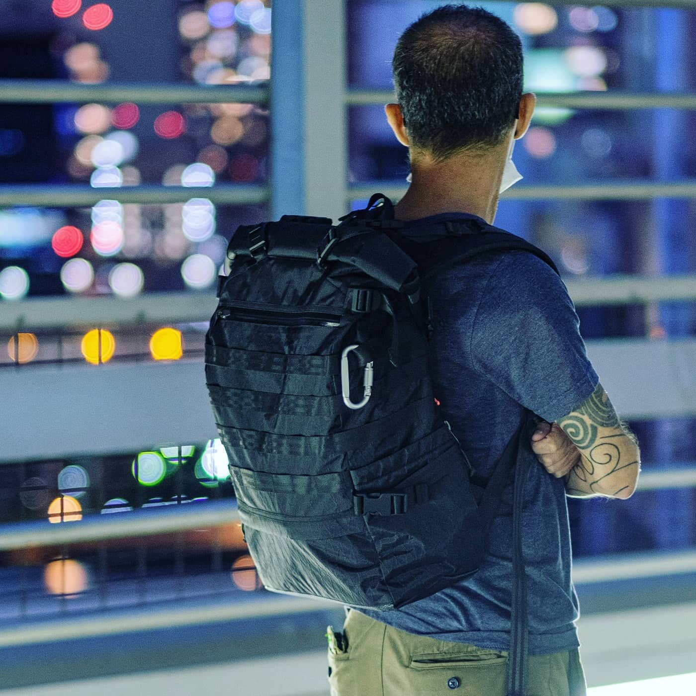 A man with a nice backpack..
@enrico.ciccu 

Shooting time on the Rainbow Bridge.
Night photography raid with my two pals @immenor and CQ.

#orbitgear @orbitgear #tokyourbanlife #urbanphotography #techweartokyo #techwear  #instadaily #instagood #fuji