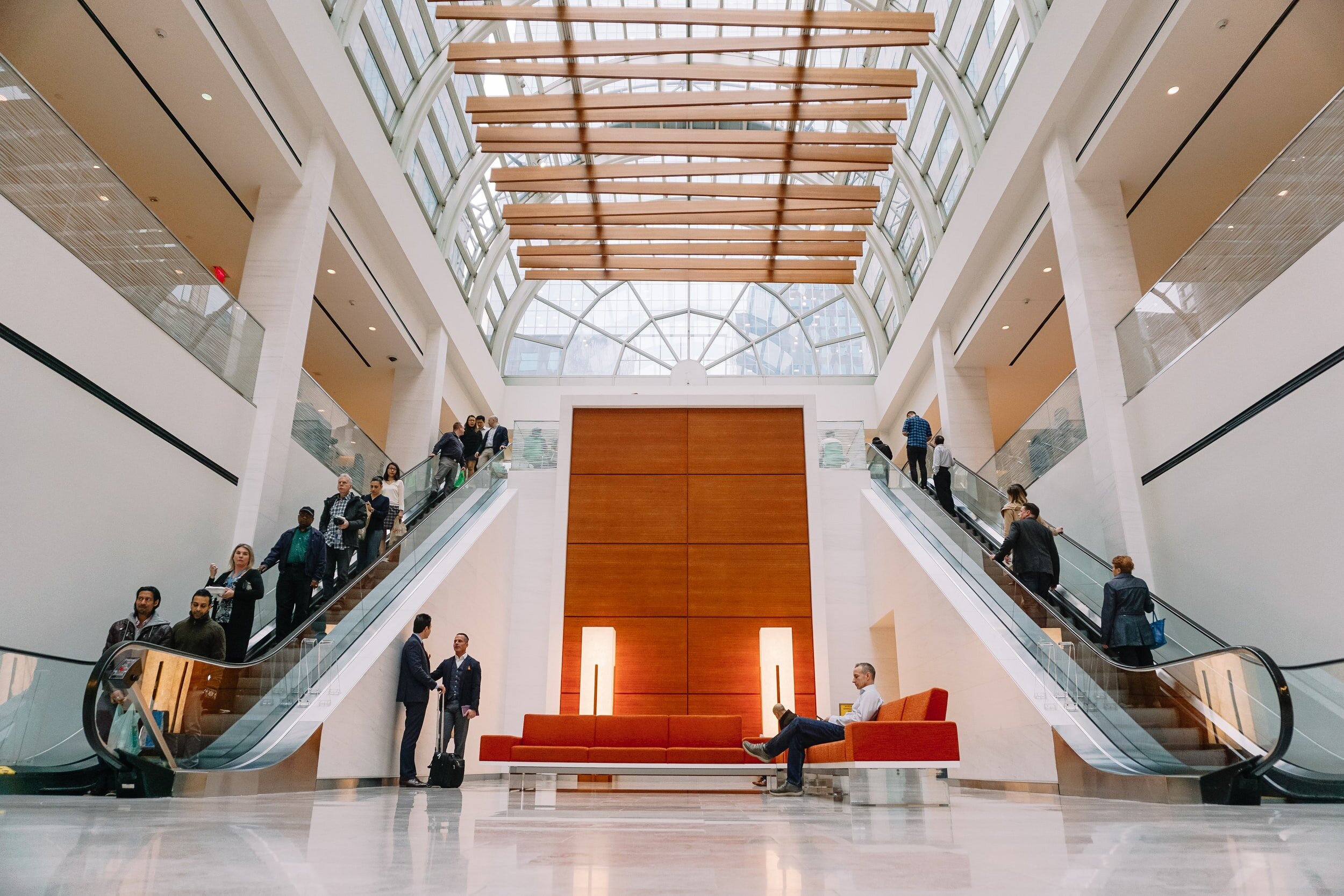 people-going-up-and-down-escalator