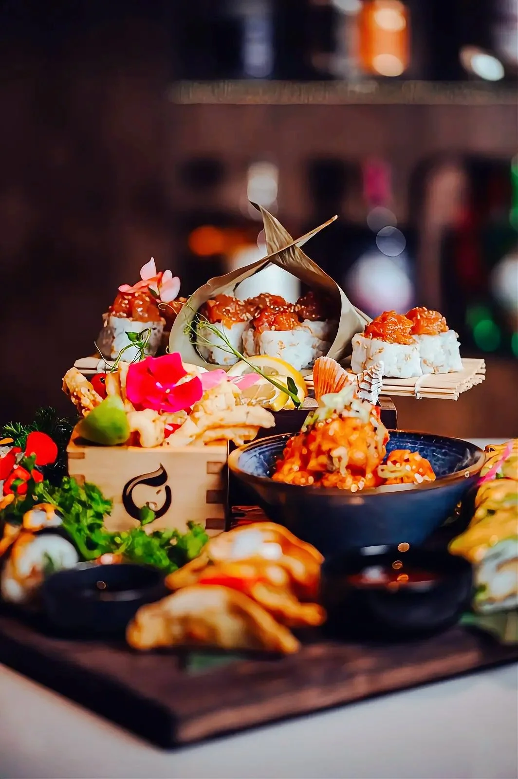 nicely displayed asian food on the table