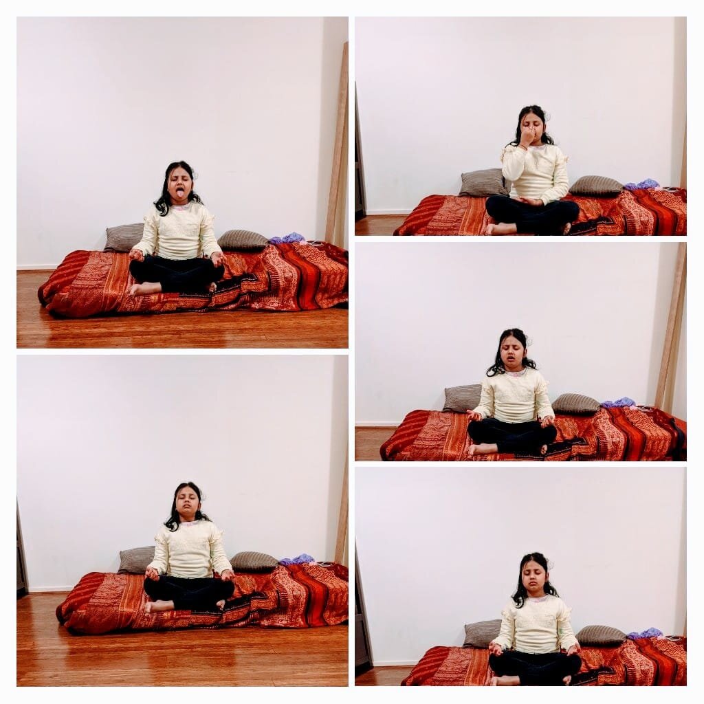 Child practicing different yoga poses on a mat with blankets and pillows, sitting cross-legged and performing facial expressions and breathing exercises.