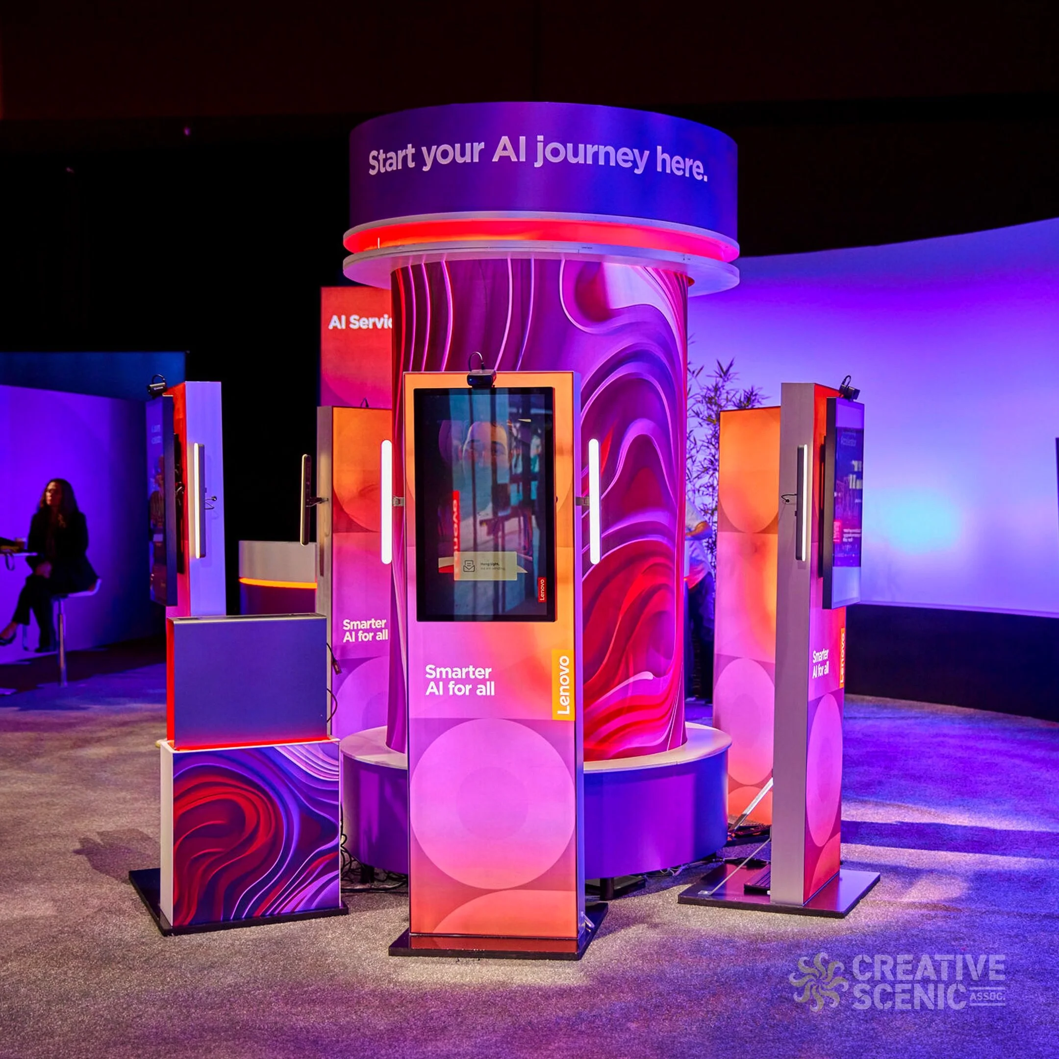 Not every screen is meant to be watched; some are meant to be touched. This interactive kiosk has displays, and a construction designed to pull people in, getting attendees to walk up and engage with Personal AI Agents&ndash;not just glance and move 
