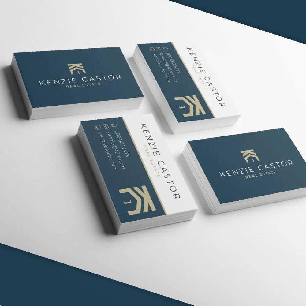 Business cards for Kenzie Castor Real Estate, with a blue and white color scheme, including contact information and a logo.
