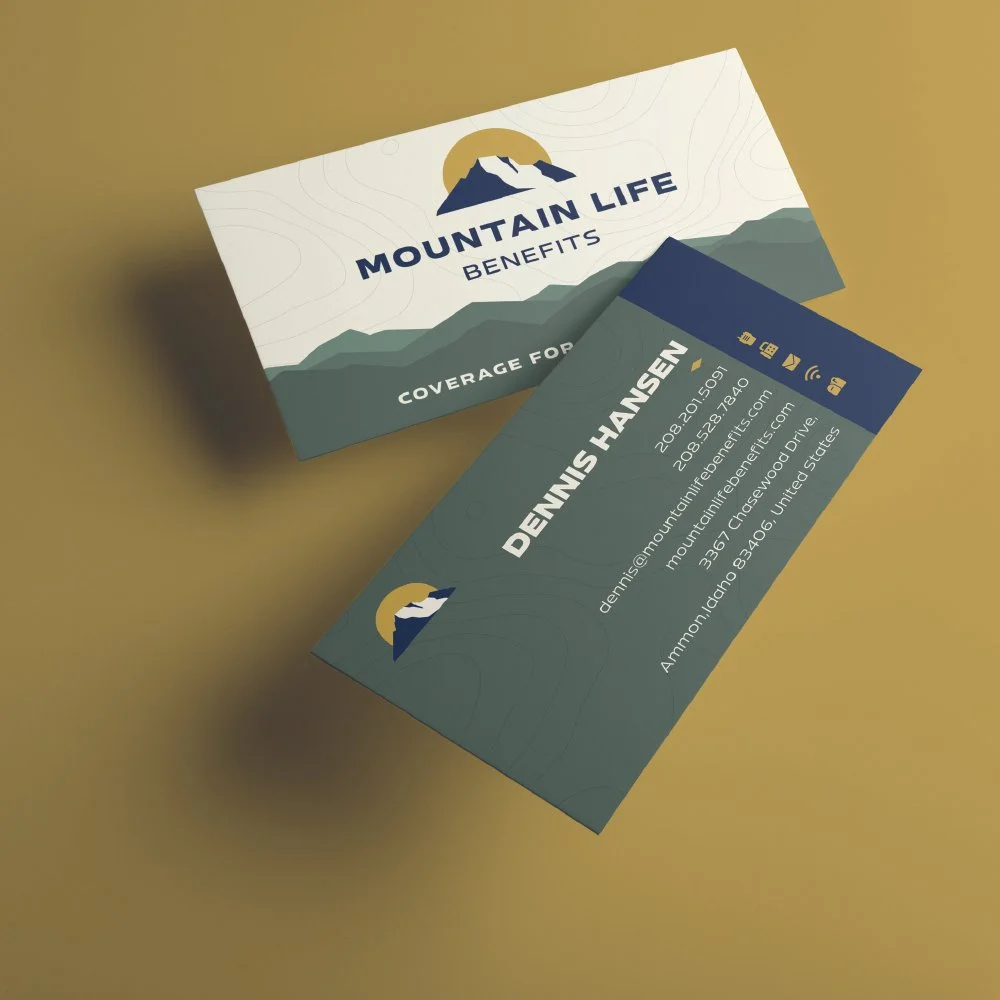 Mountain Life Benefits business card with mountain logo, displaying contact information for Dennis Hansen, including phone, email, website, and physical address, with mountain-themed design and icons.