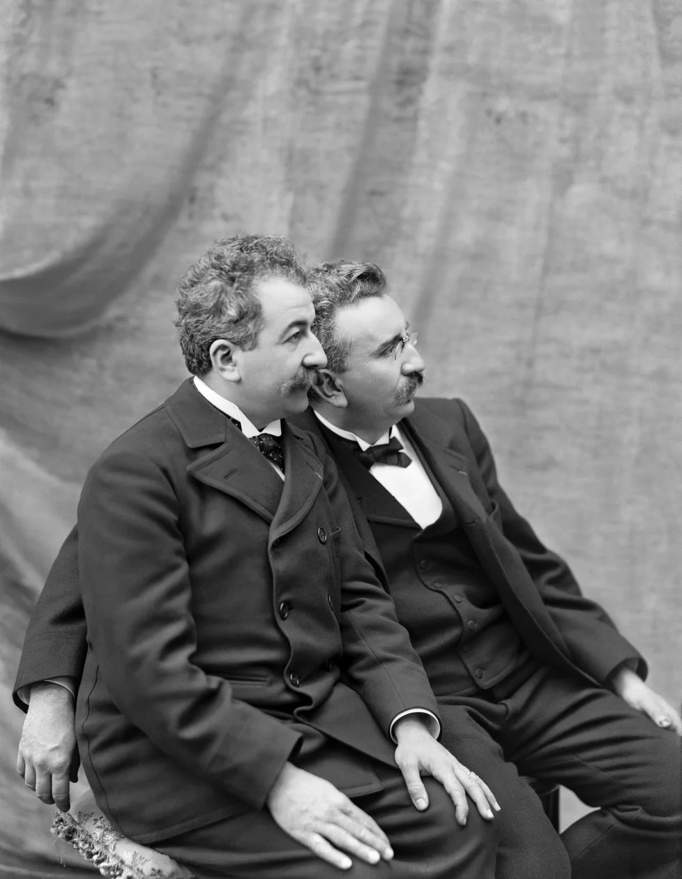 Auguste and Louis Lumière. Photographer unknown; photograph published by 1925. Via Wikimedia Commons. Public domain in the United States.