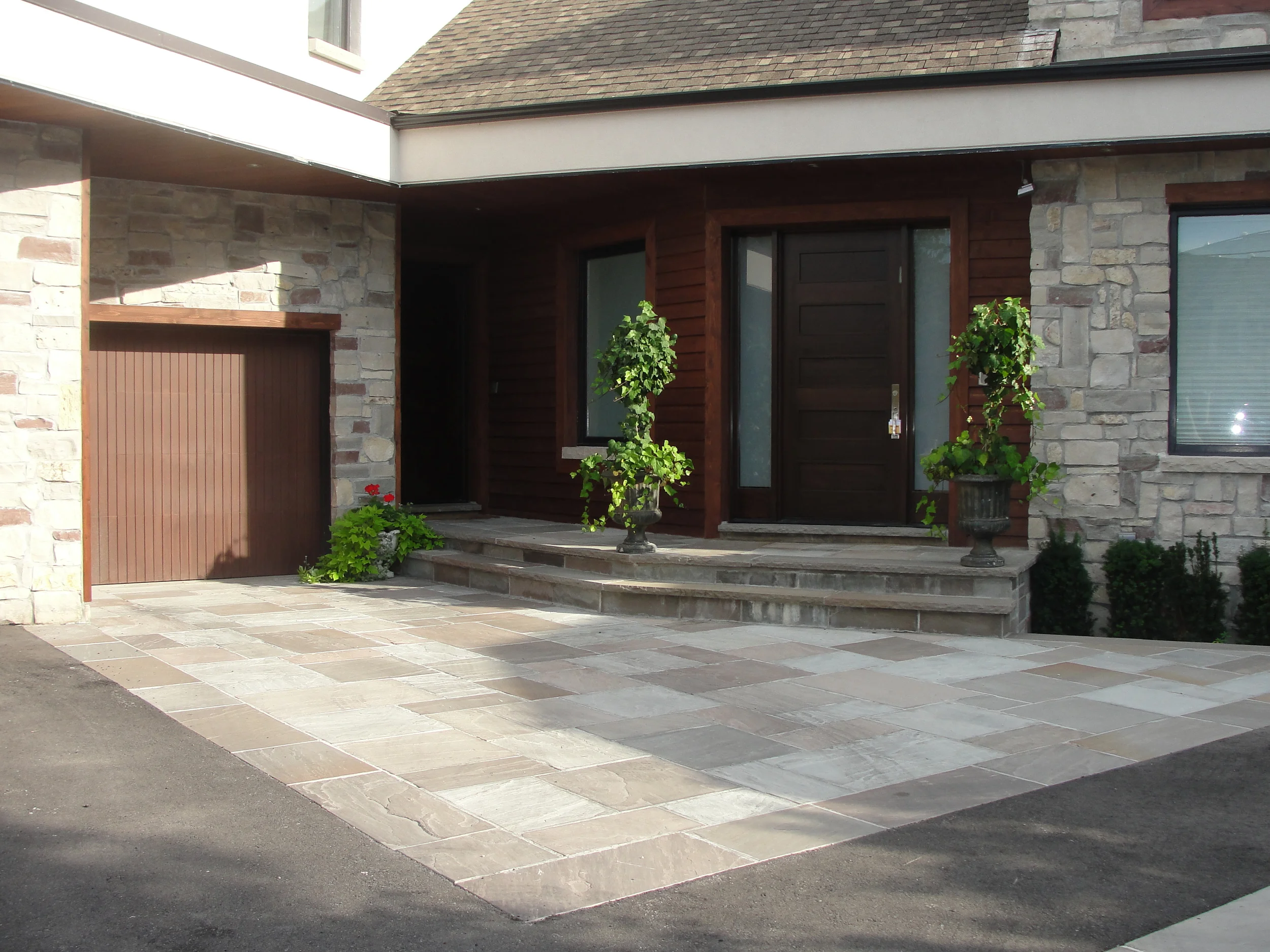 Richmond Hill - New stone facade, plagstone paving and steps.jpg