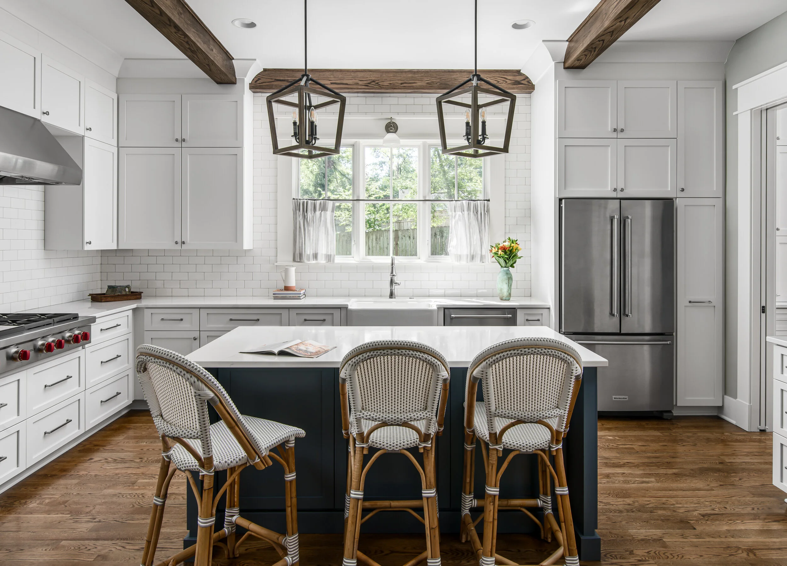 White kitchen with blue island