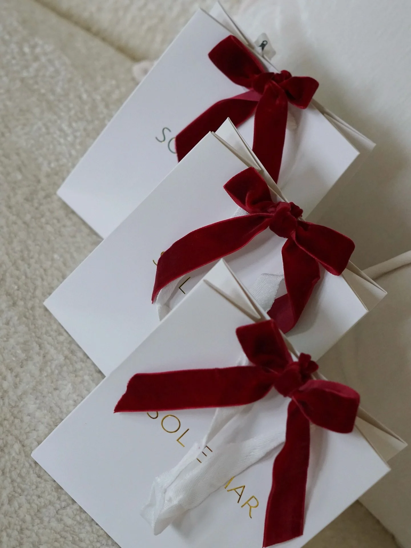 Your Christmas gifts, beautifully wrapped + ready to give. 🎁✨ #giftideas #christmasgifts #redbow #giftsforher #fyp