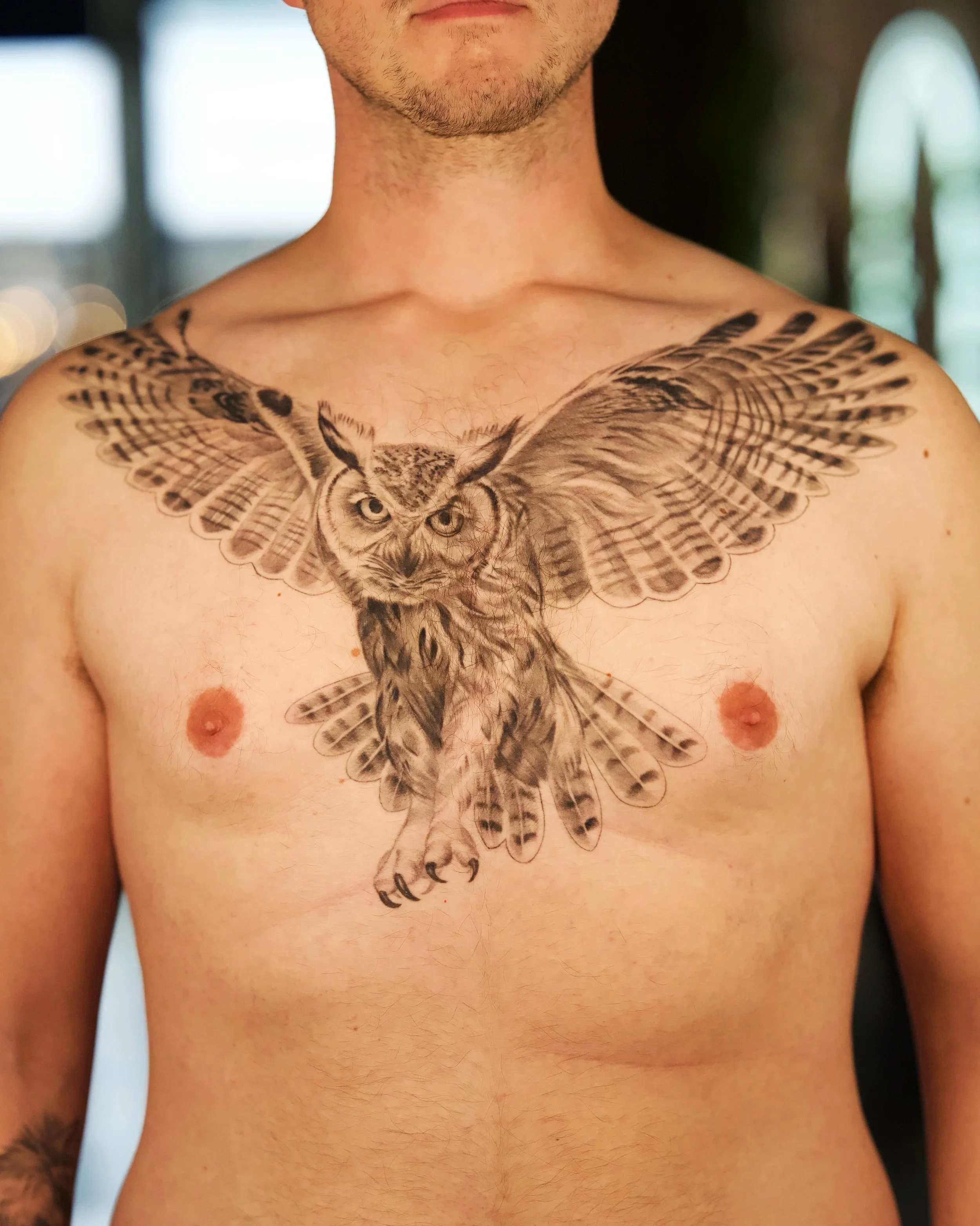 realism owl tattoo across the chest