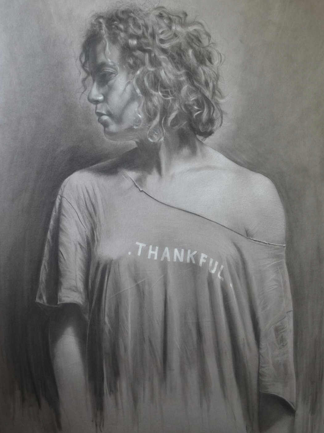 Charcoal, white chalk, pan pastel realism drawing of a woman. Brian Parrillo art, fine art, tattoo artist in Durham North Carolina at Ethereal Tattoo Gallery. On display in Durham, North Carolina.