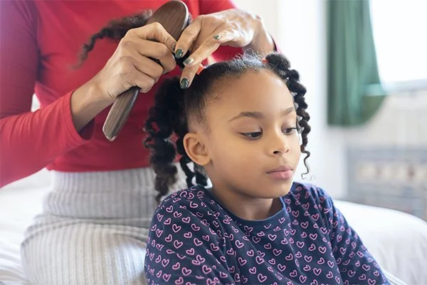 Comb Through Kinks, Curls, and Coils with Black-owned Hair Care for Kids