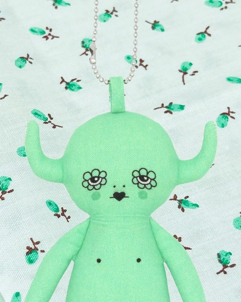 Mint Devil

She is the shapeshifter&mdash;a facet of ourselves that drifts inwards, not to escape, but to transform in secret. Dwelling in states of liminality&mdash;neither here nor gone&mdash;she slips between unseen worlds. You may not notice her 