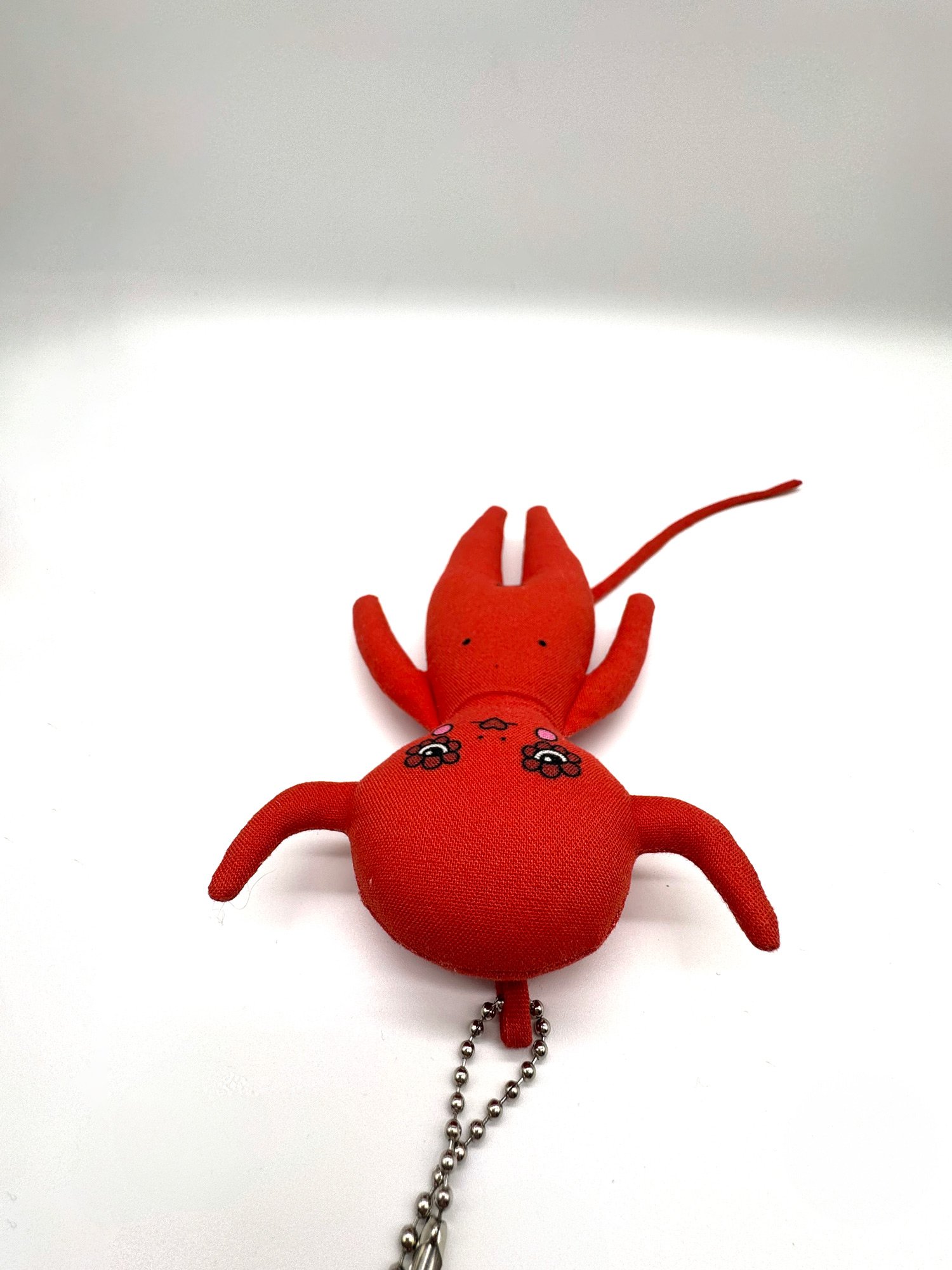 bri-foster-dolls-6-inch-red-devil-bag-charm-doll-keychain-top-distorted-view.jpg