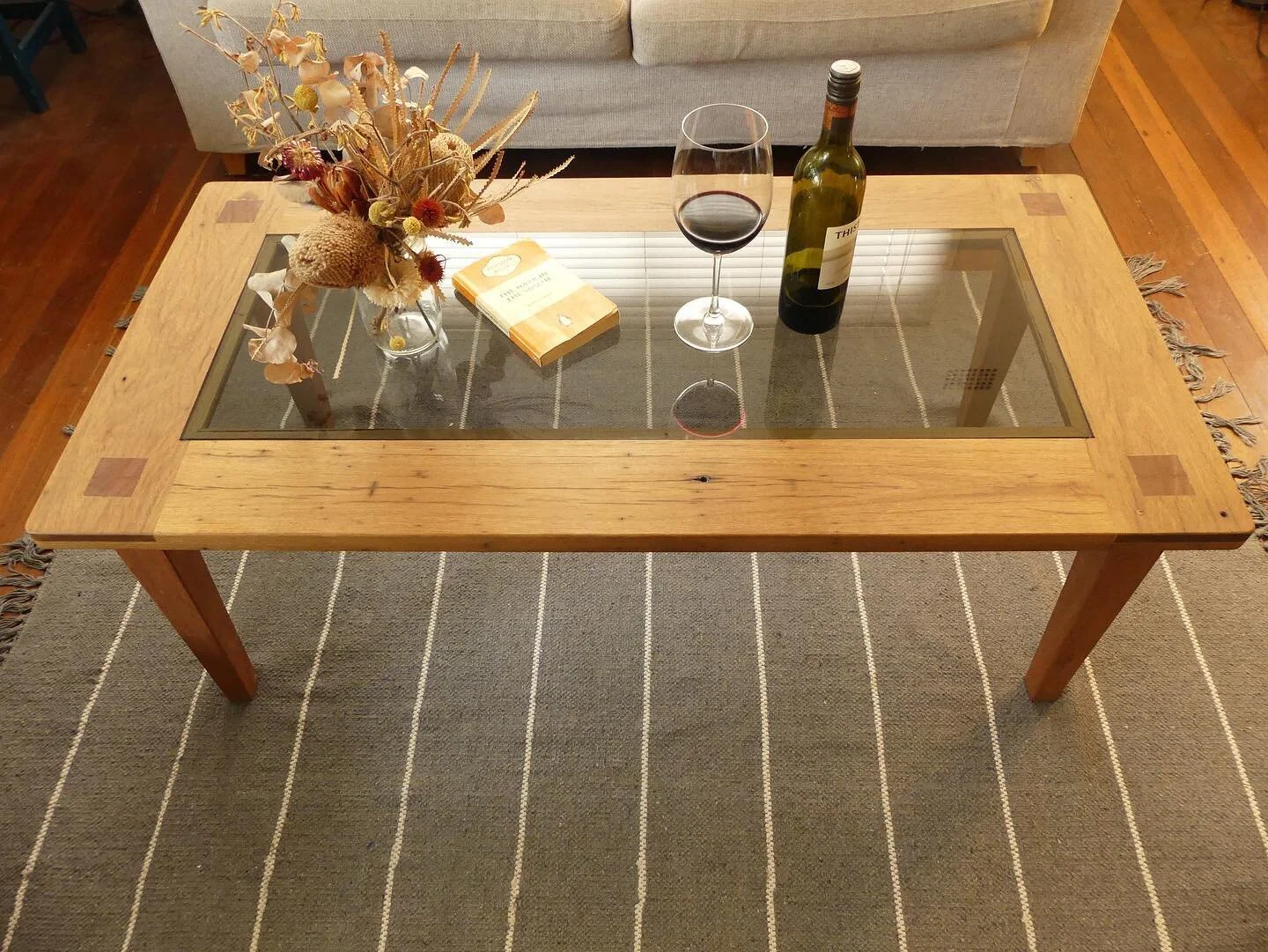 This coffee table I made with recycled timber from a Tweed Heads Boardwalk.
Featuring a glass inlay &amp; sleek design, it&rsquo;s making that glass of red look pretty inviting even on a Monday morning.
This one is for sale, so if you&rsquo;re intere