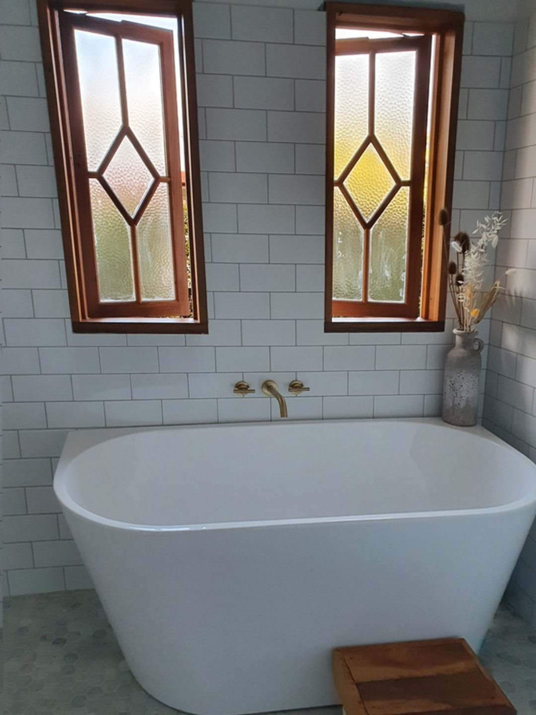 Restored stained glass windows in bathroom.png