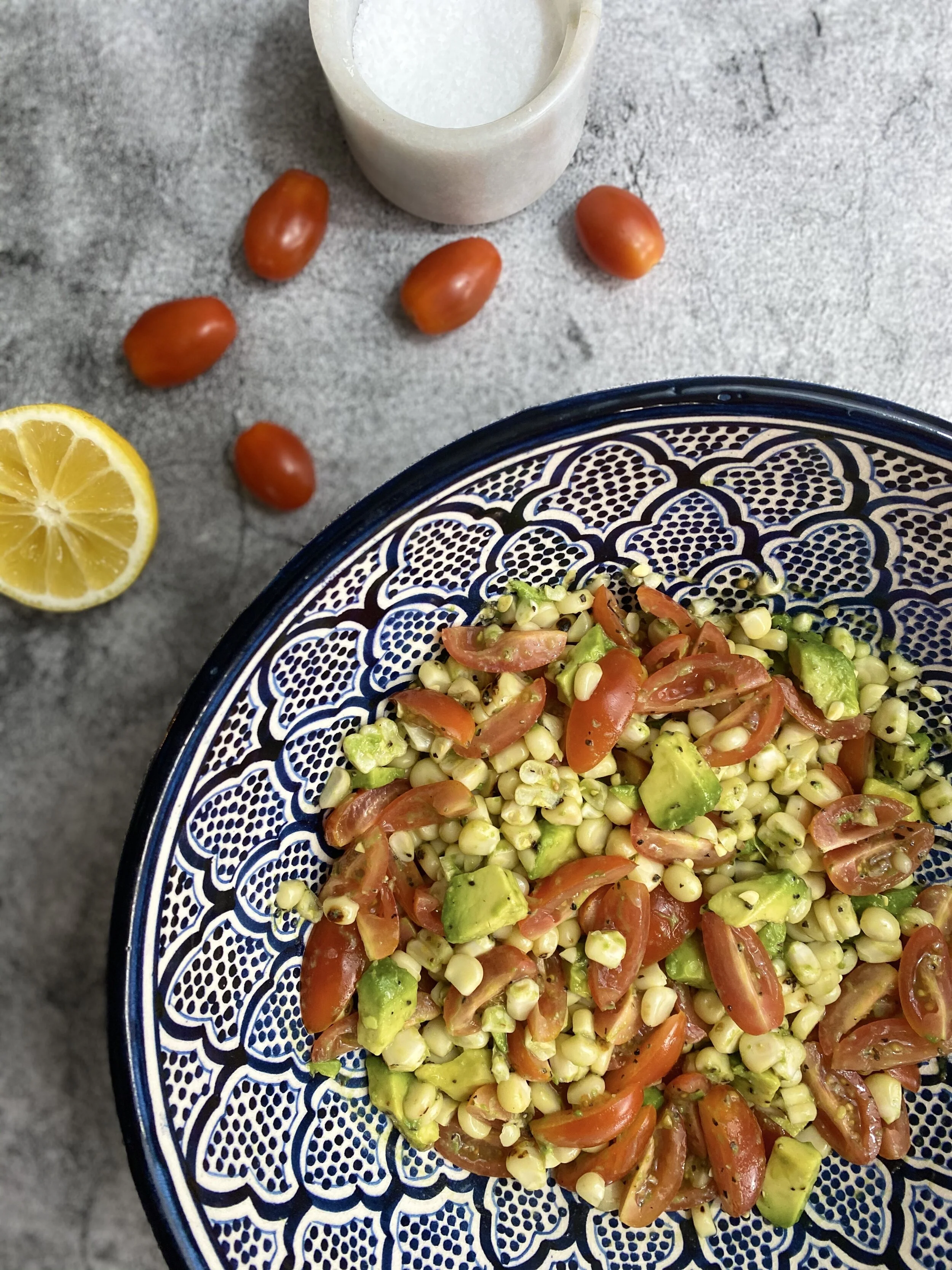 ROASTED TOMATO, CORN AND AVOCADO SALAD
