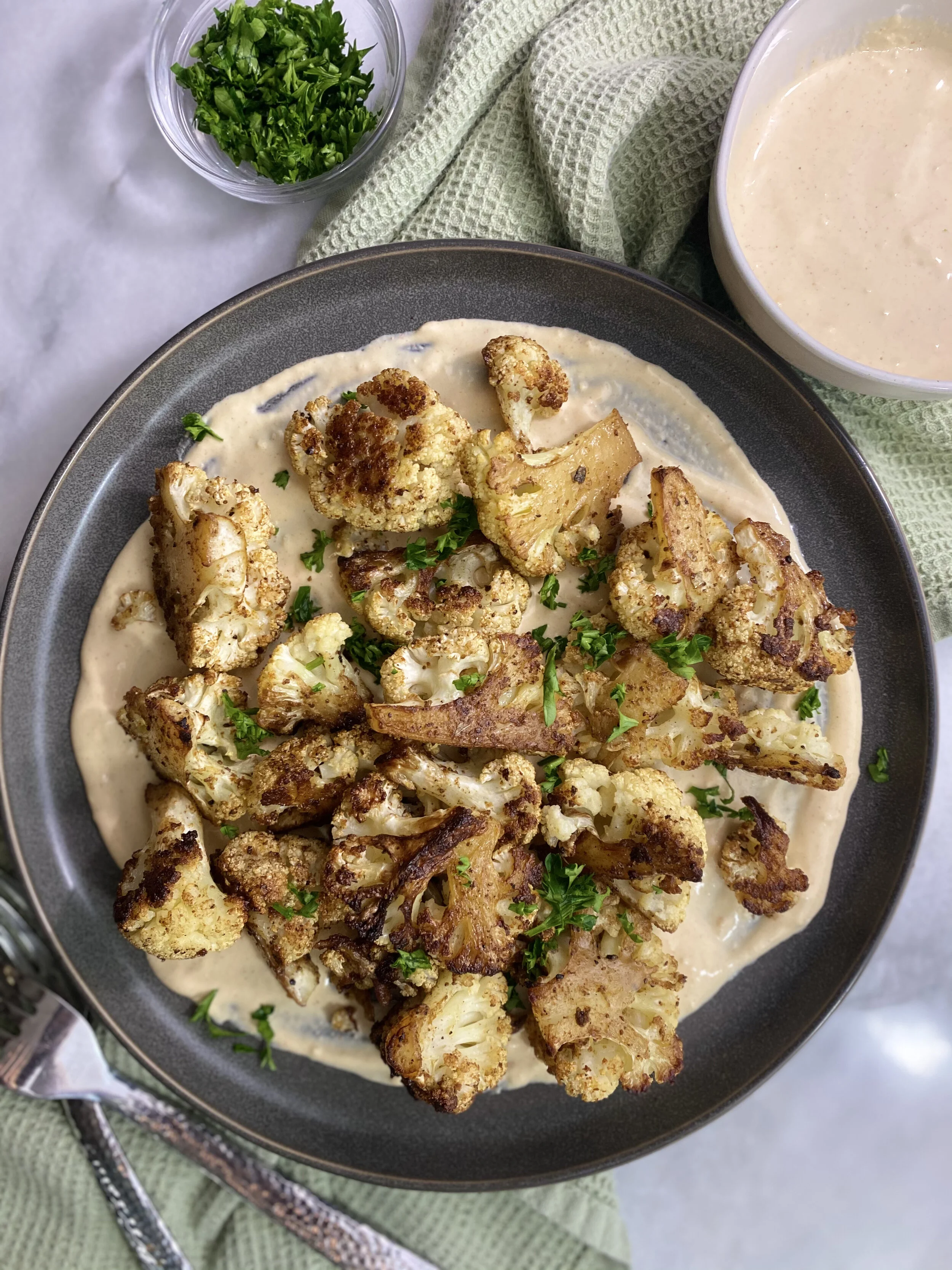 ROASTED CAULIFLOWER W/ TAHINI SAUCE