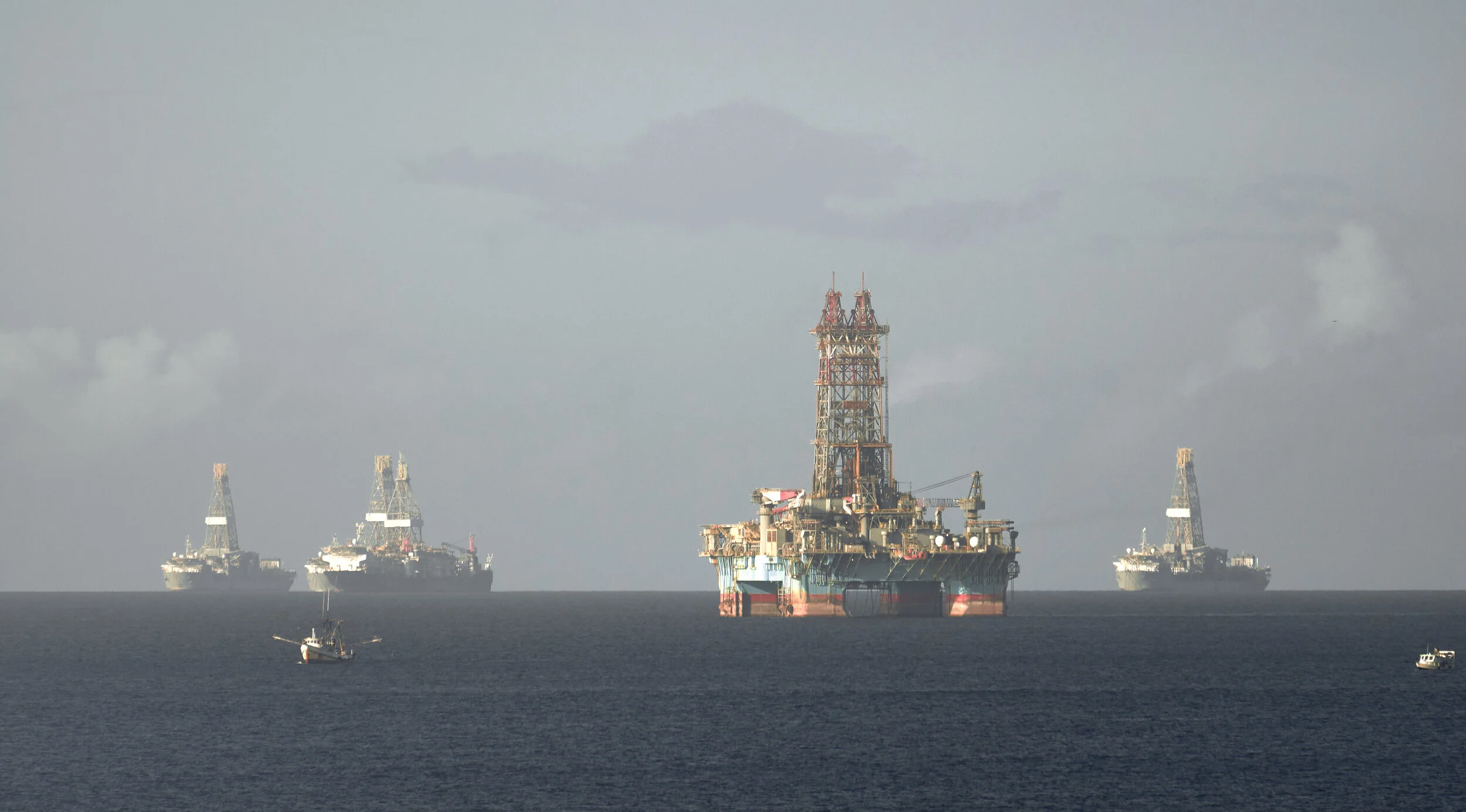 Deepwater oil platform waiting to be towed to an offshore oil field. Unlike most Caribbean nations and territories, which rely heavily on tourism, Trinidad and Tobago's economy is primarily industrial with an emphasis on petroleum and petrochemicals;
