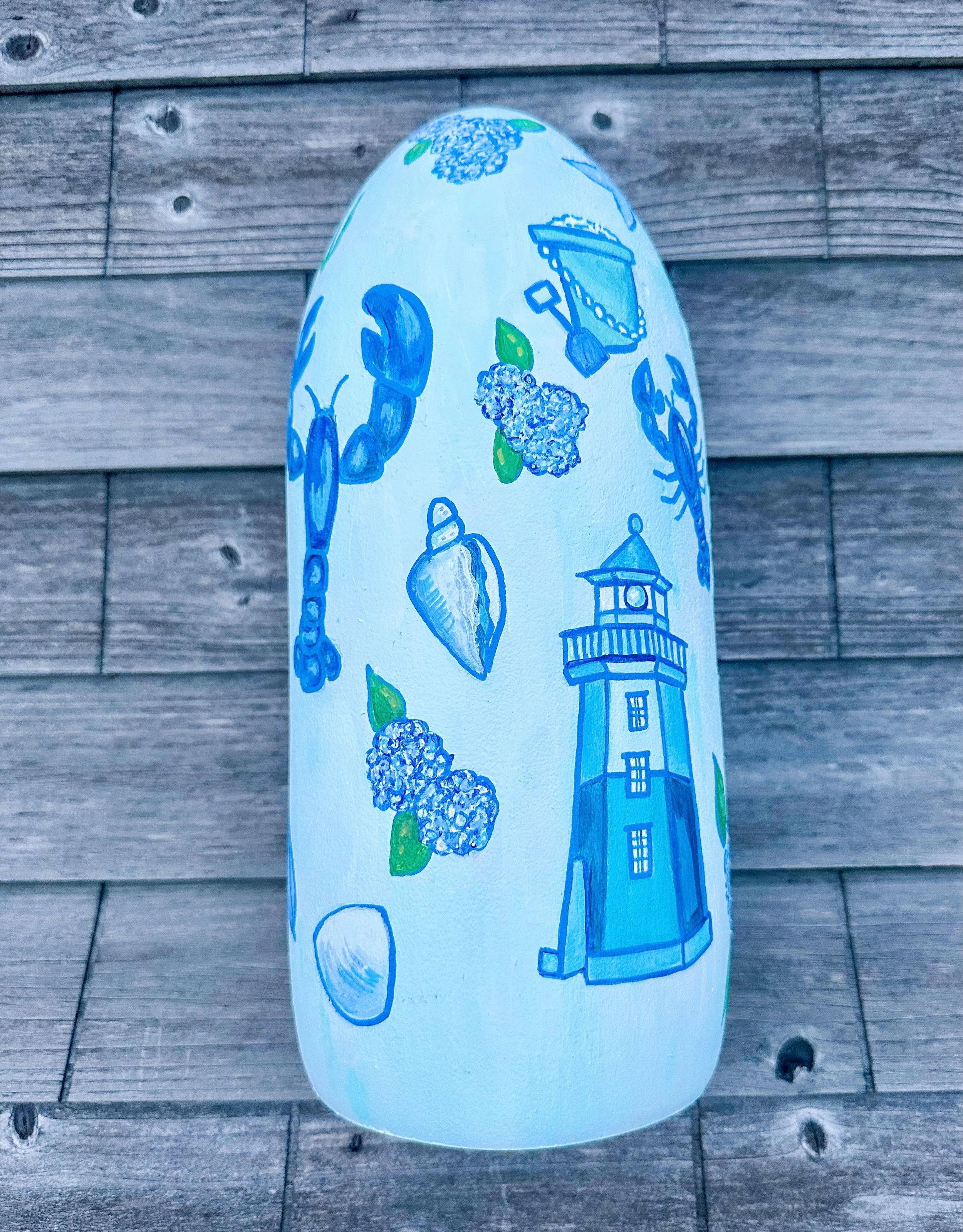 I painted a buoy for @jackscornerfoundation! 
Really leaned into the lobster theme and squeezed in as many coastal blues as I could 💙

This piece will be for sale at tomorrow&rsquo;s event.

Event tickets still available at the link in my stories!