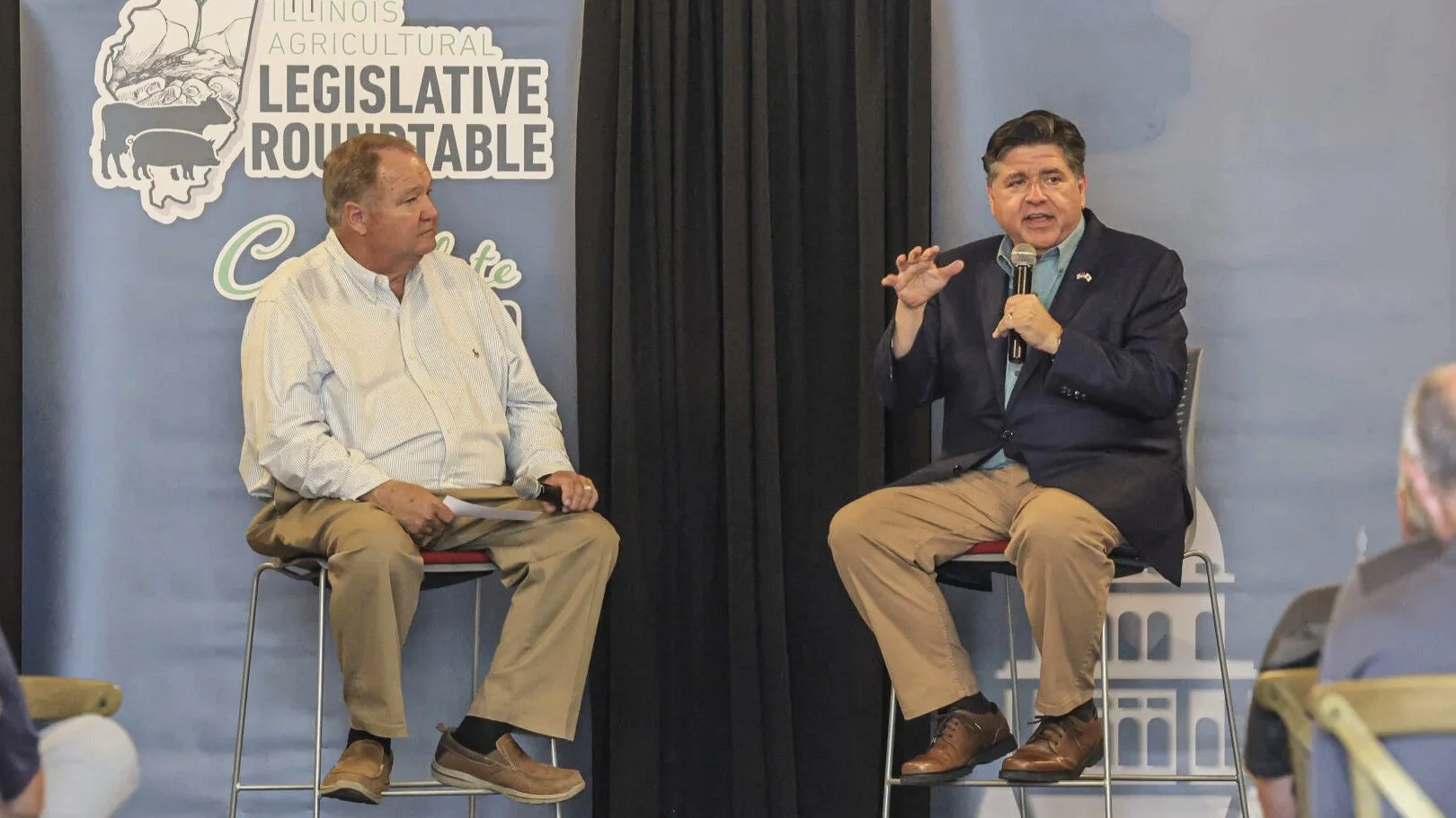 Pritzker, Bailey Trade Barbs in Front of Ag Audience
