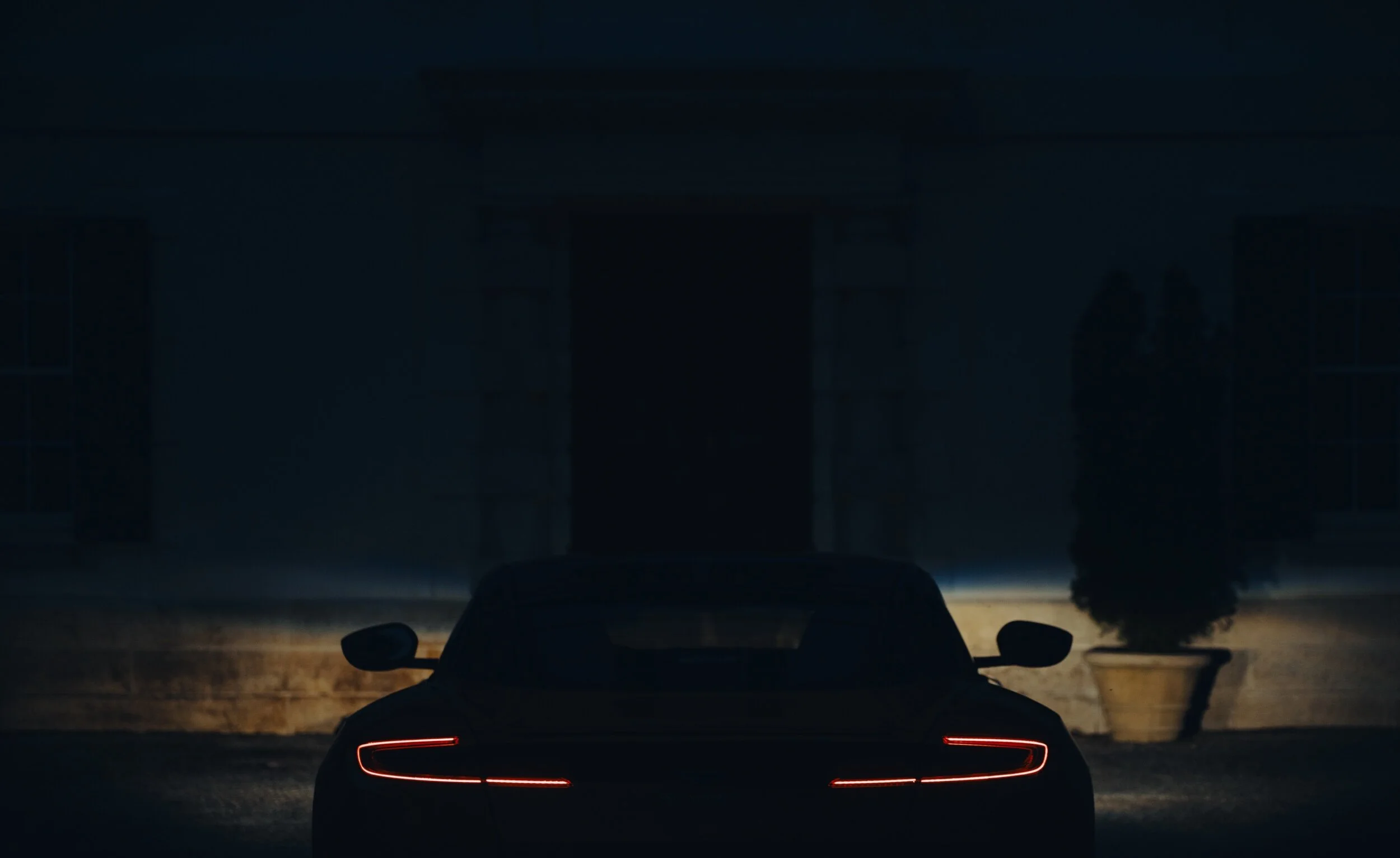 DB11_Rear_EWH_Night.jpeg