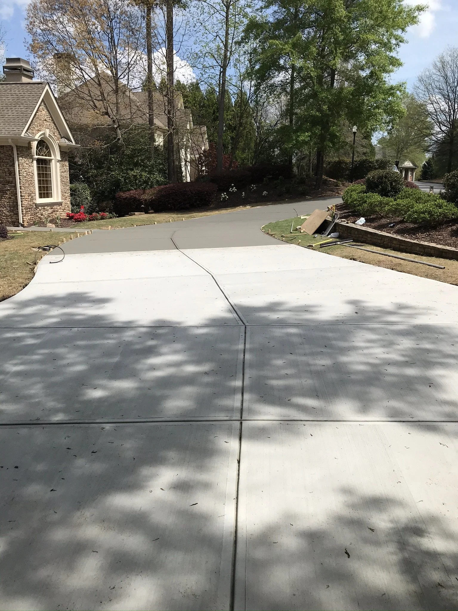  Driveway repoured and expanded.  