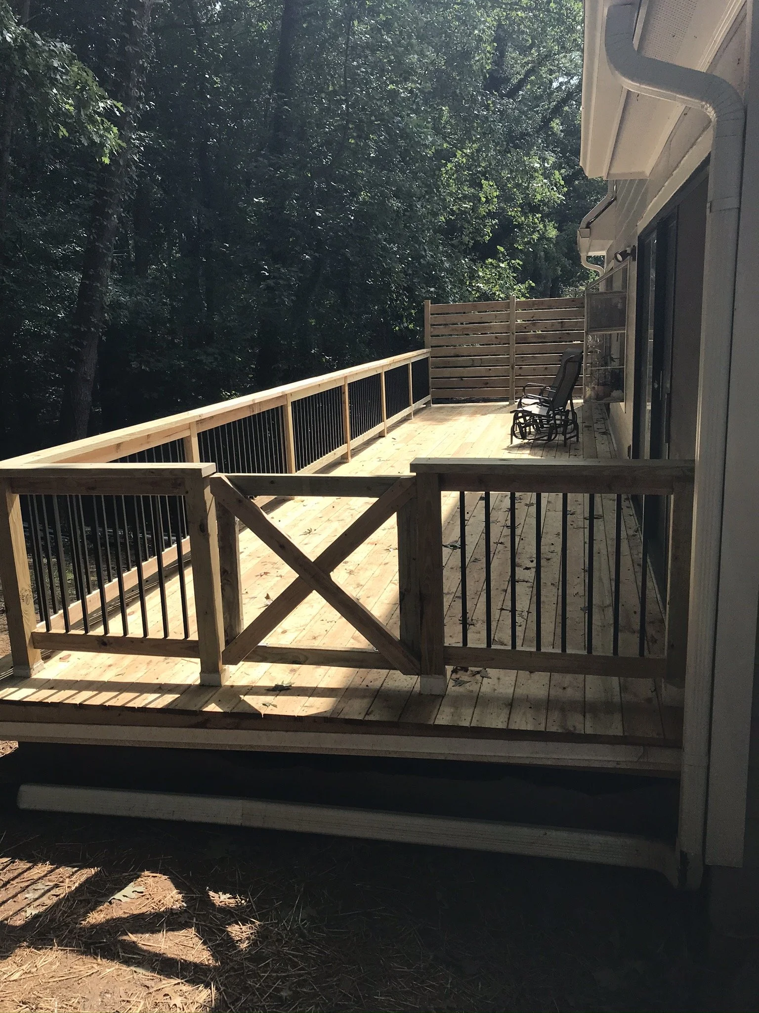 Deck addition over flat roof. 