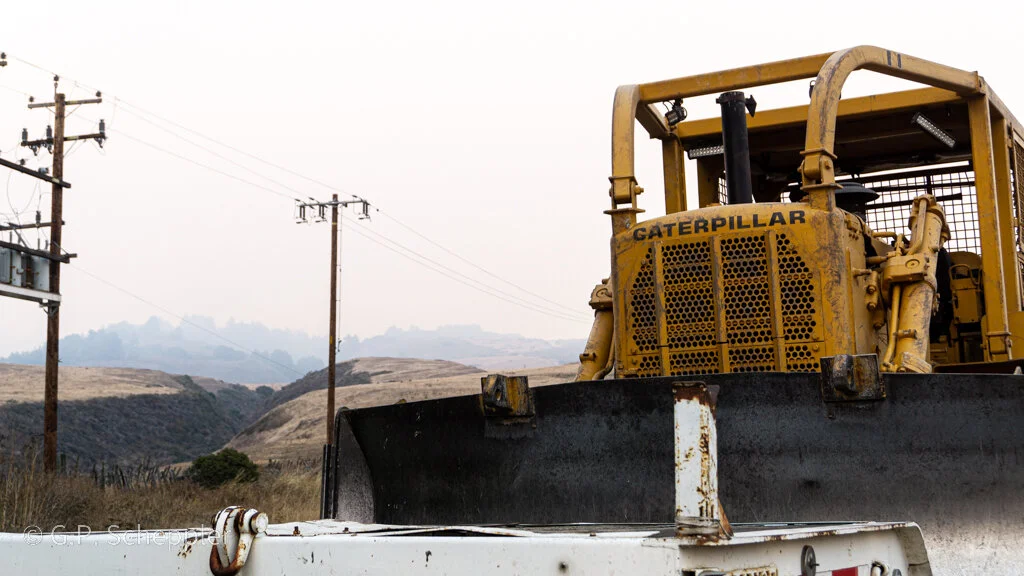 A combination of local, state and federal agencies are working hand in glove with contractors to cut and burn a line to protect the community of Davenport.