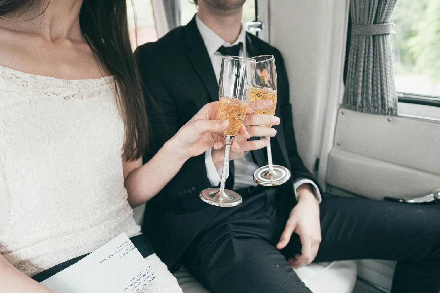 MELBOURNE  EDITORIAL WEDDING PHOTOGRAPHY, BRIDE AND GROOM POSING NEXT TO A OLD SCHOOL VW KOMBI VAN, INSIDE THE VAN HAVING A CHAMPAGNE IN CLASSIC FLUTES