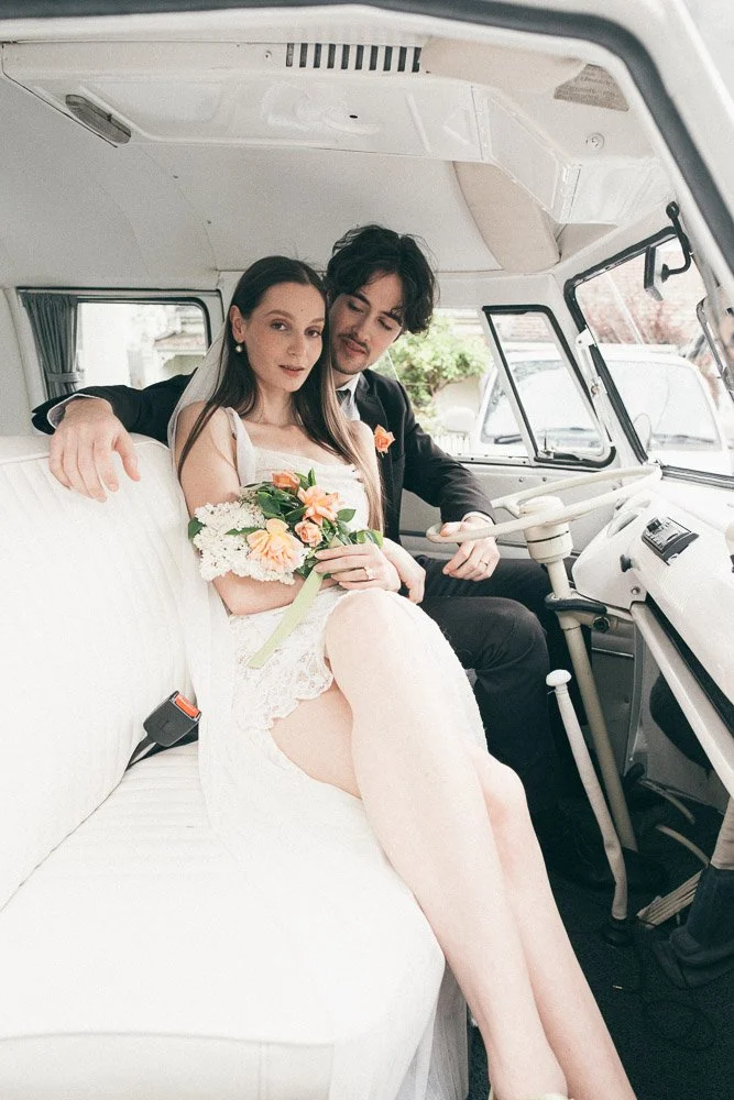 MELBOURNE  EDITORIAL WEDDING PHOTOGRAPHY, BRIDE AND GROOM POSING IN A OLD SCHOOL VW KOMBI VAN