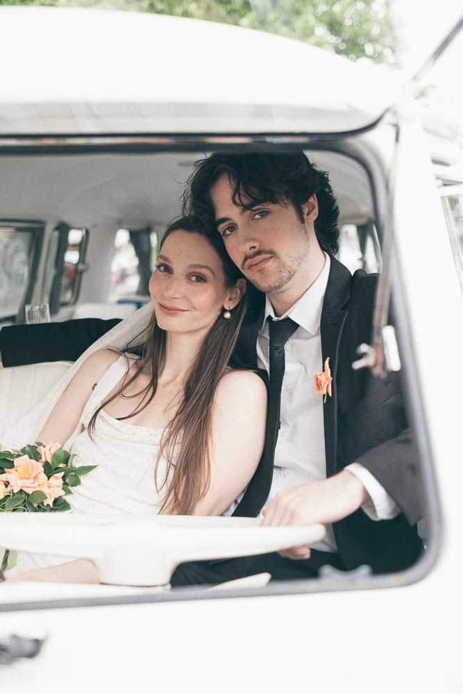MELBOURNE  EDITORIAL WEDDING PHOTOGRAPHY, BRIDE AND GROOM POSING IN A OLD SCHOOL VW KOMBI VAN