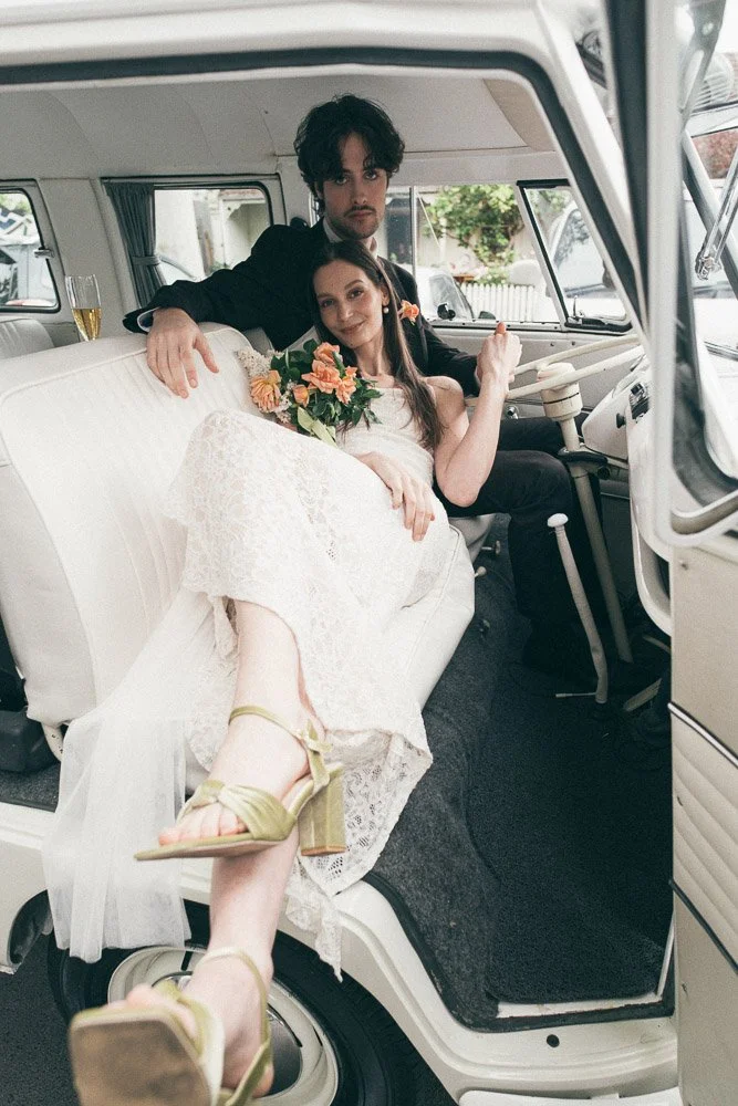 MELBOURNE  EDITORIAL WEDDING PHOTOGRAPHY, BRIDE AND GROOM POSING IN A OLD SCHOOL VW KOMBI VAN