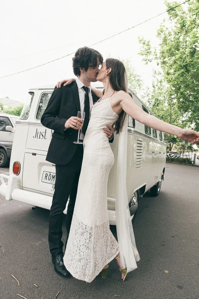 MELBOURNE  EDITORIAL WEDDING PHOTOGRAPHY, BRIDE AND GROOM POSING IN A OLD SCHOOL VW KOMBI VAN