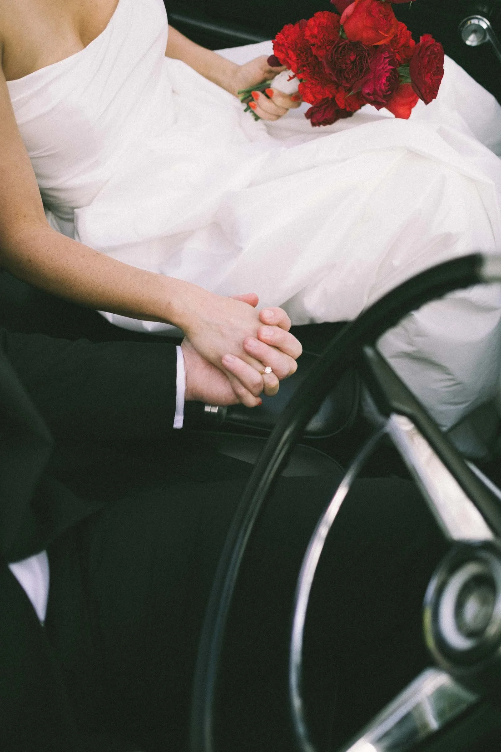 MELBOURNE BOTANICAL GARDEN WEDDING, BRIDE AND GROOM POSING IN A VINTAGE CONVERTIBLE CAR