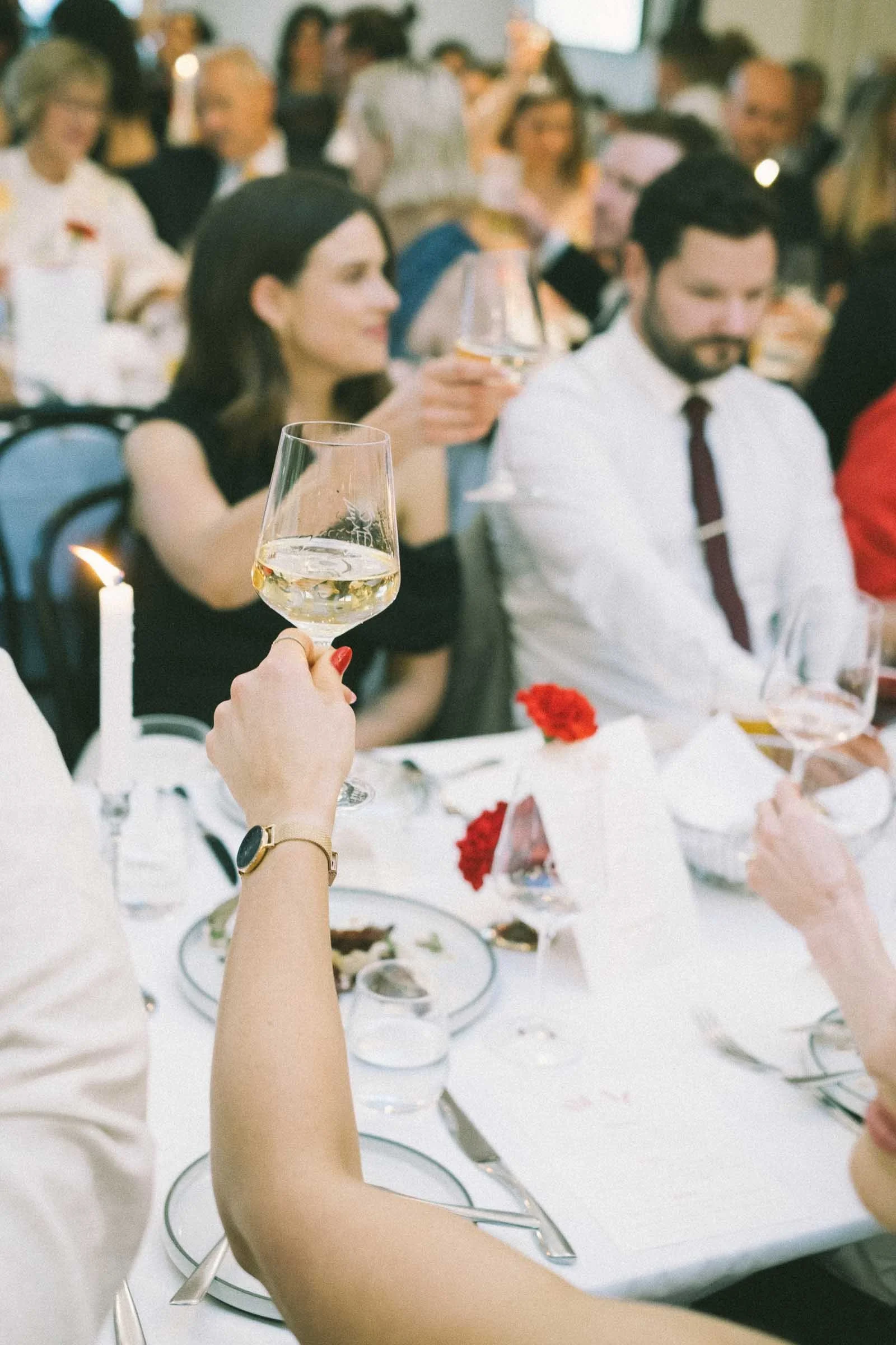 MELBOURNE BOTANICAL GARDEN WEDDING RECEPTION AT THE TERRACE, BRIDE AND GROOMS ENERGY FILLED ENTRY IN THE RECEPTION WITH GUESTS CHEERING, RAISING A TOAST