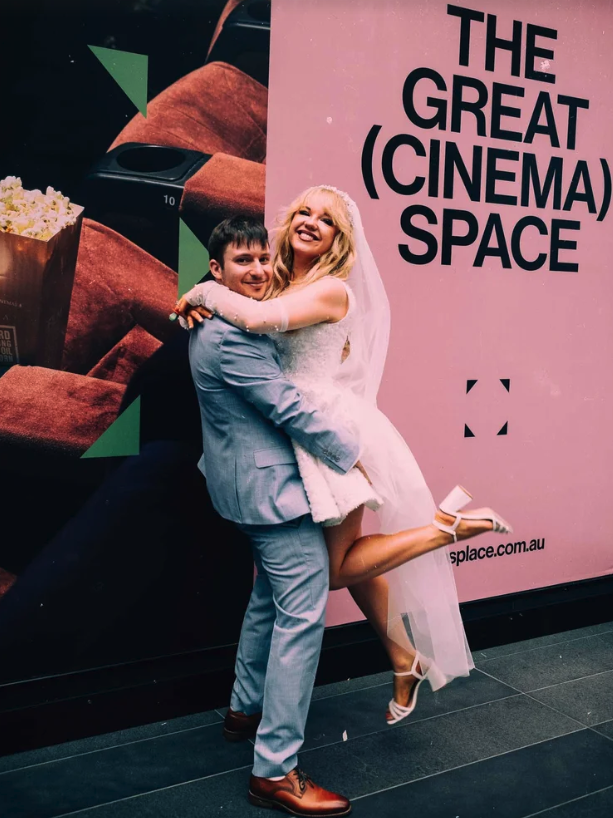 Couple Celebrating Their Melbourne Old Treasury Building Wedding In Melbourne Laneways, An Elopement Photograph in Melbourne CBD