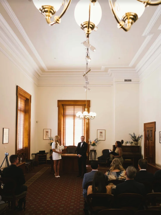 Victorian Marriage Registry wedding photography Melbourne, Couple in the Margret Craig Room at the Old Treasury Building Having Their Civil Ceremony