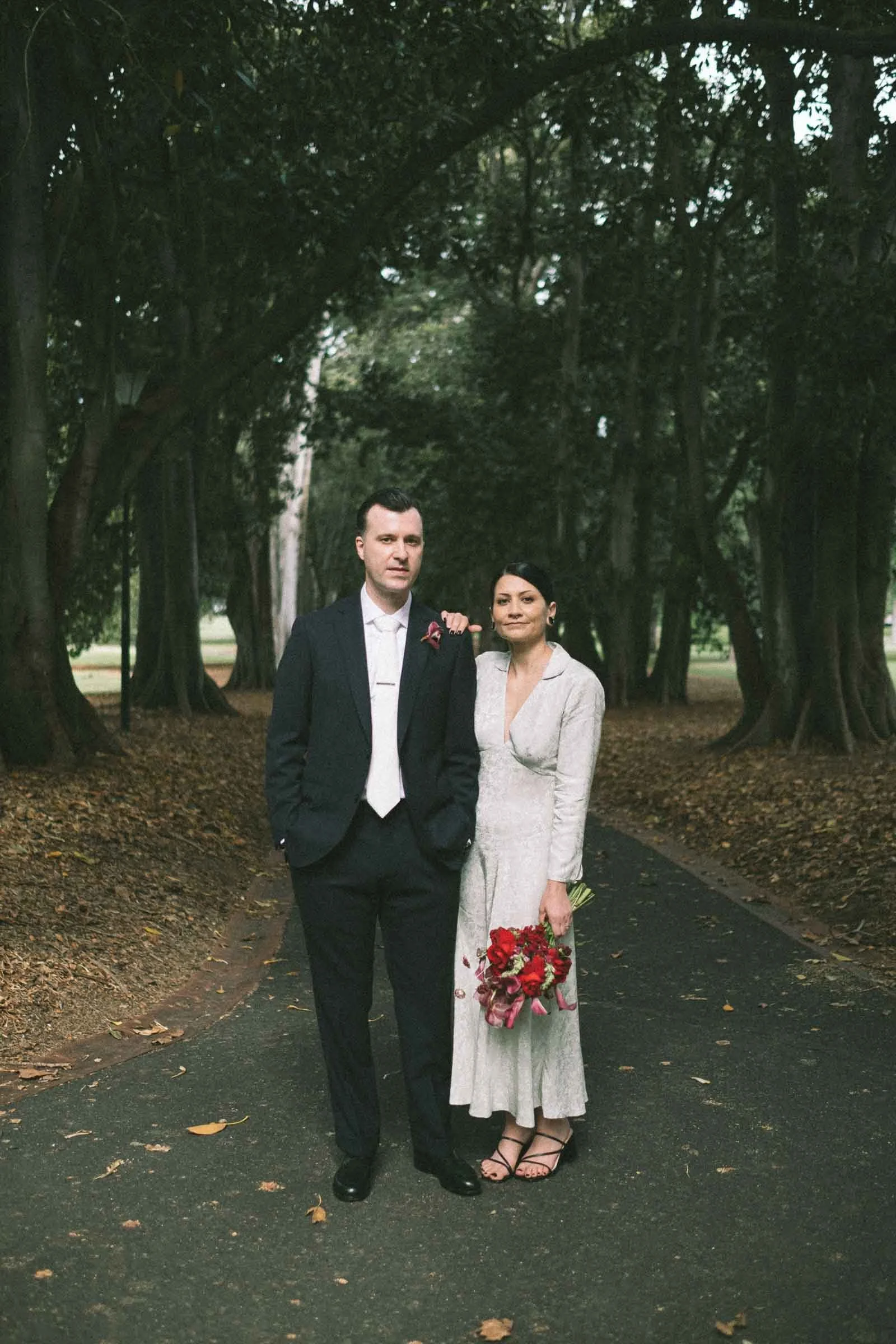 Couples Walking Through Treasury Gardens, Treasury Gardens wedding photography Melbourne