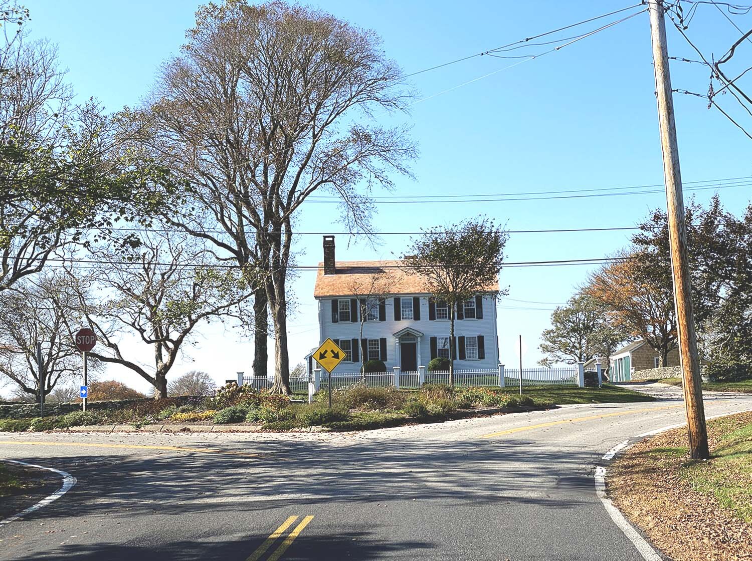 The road to the left leads to Sakonnet, Rhode Island from Tiverton’s Four Corners.