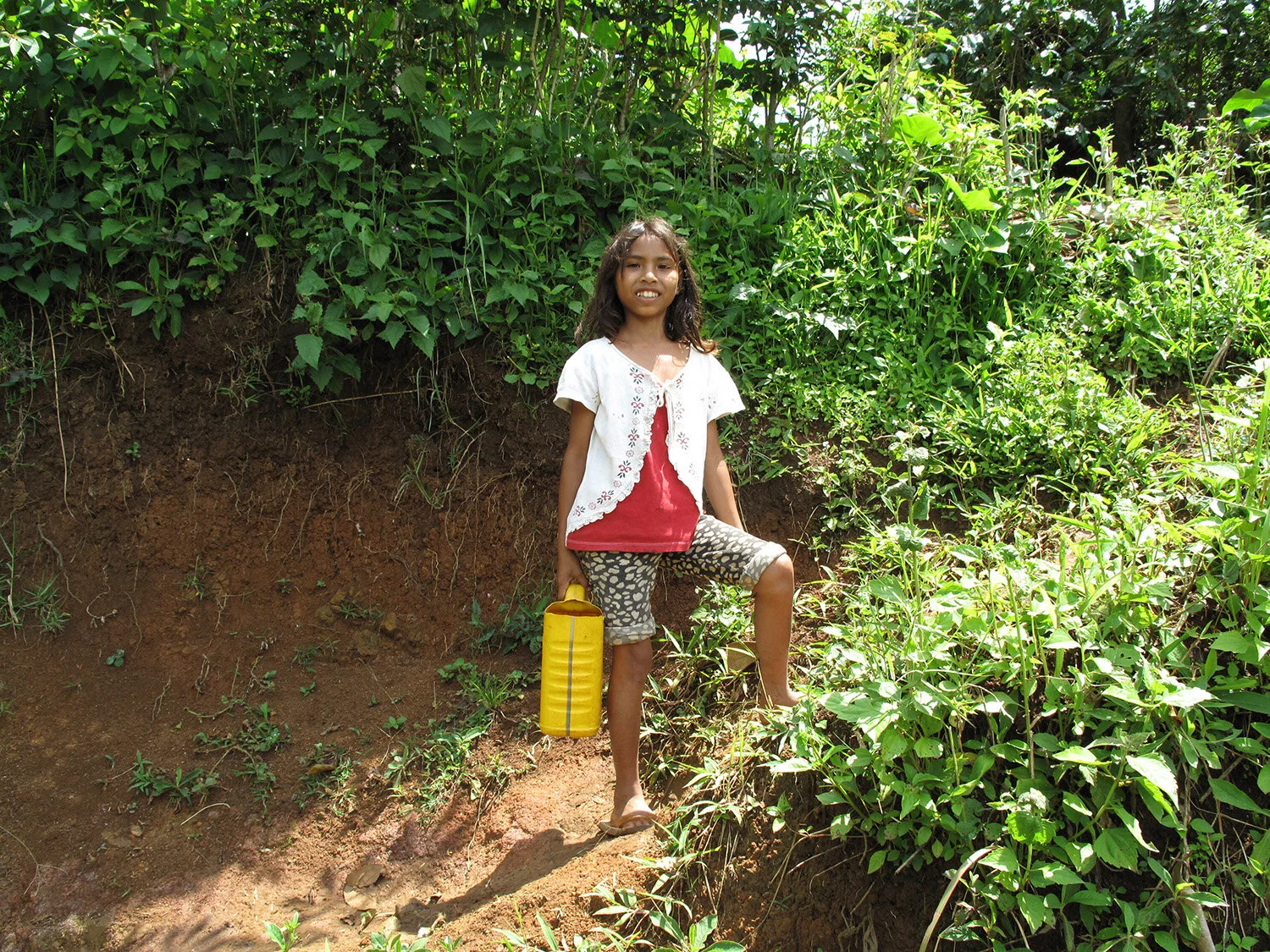flores-island-girl-with-water .jpg