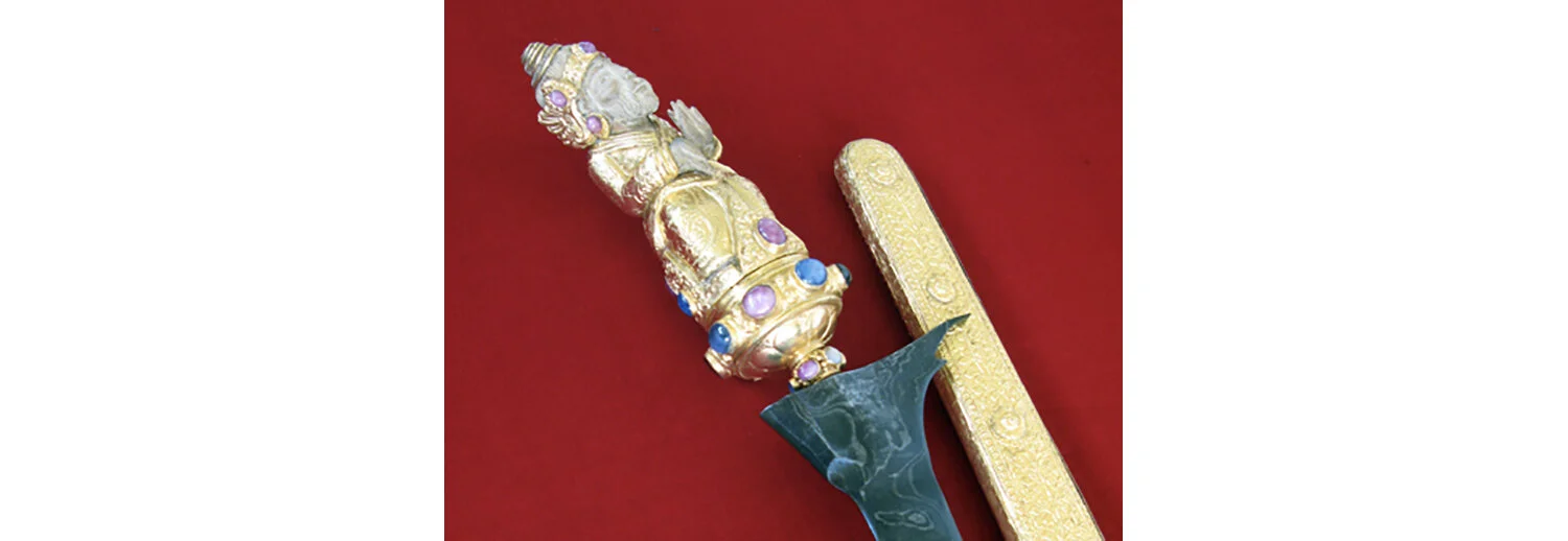 Handle of Kris is decorated with stones