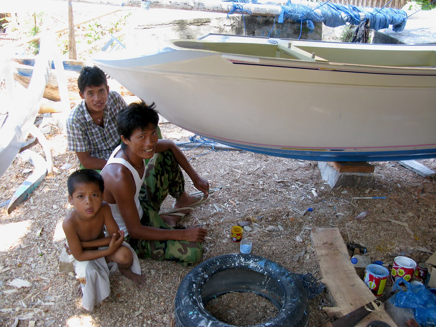 Painting details on a fishing boat