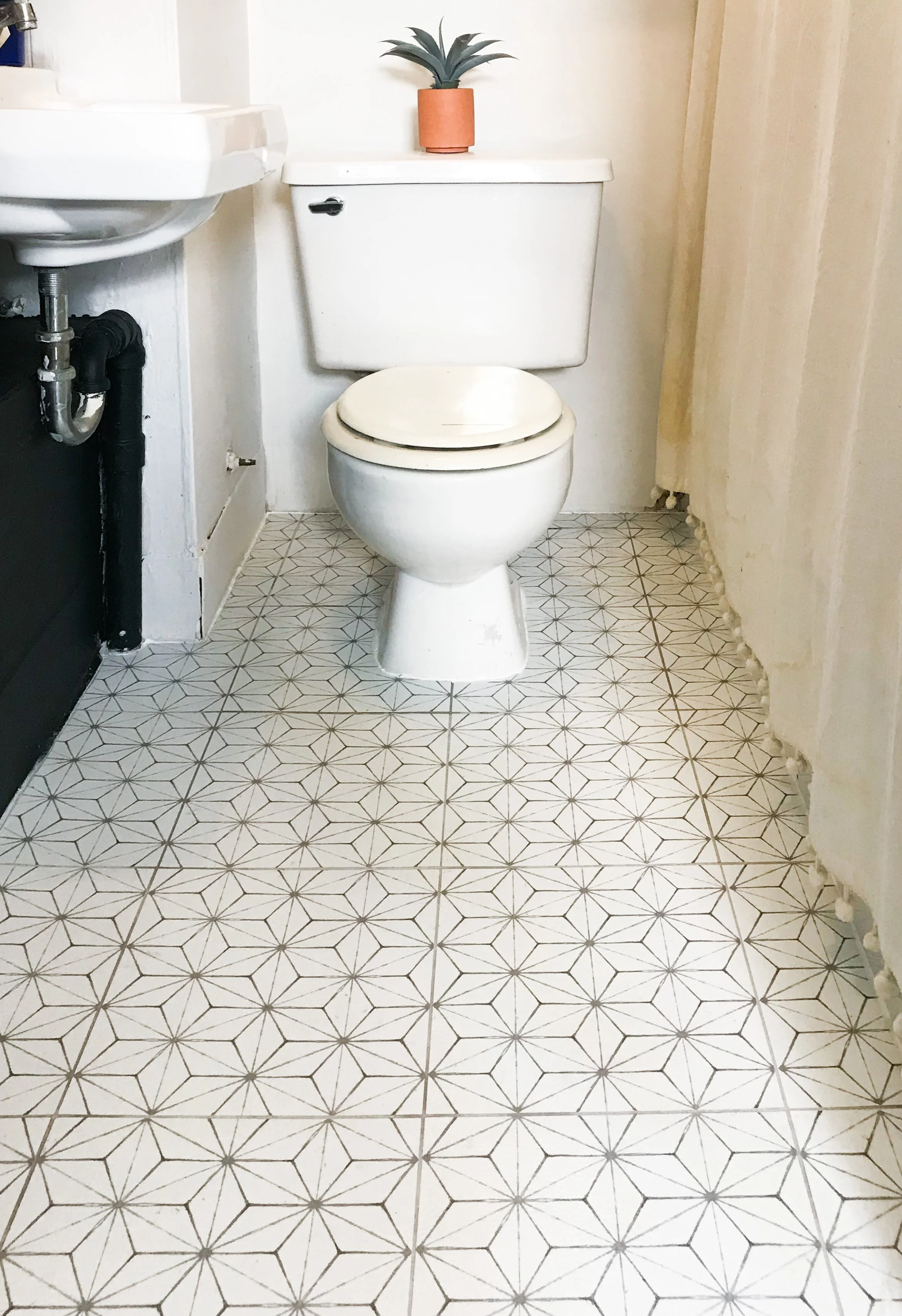 DIY Rental Bathroom Makeover — At Home with Howie