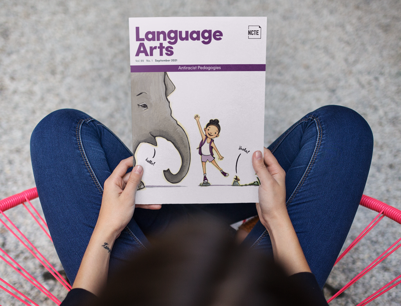 mockup-of-a-girl-holding-a-catalog-while-crossing-her-legs-a14650 (1).png